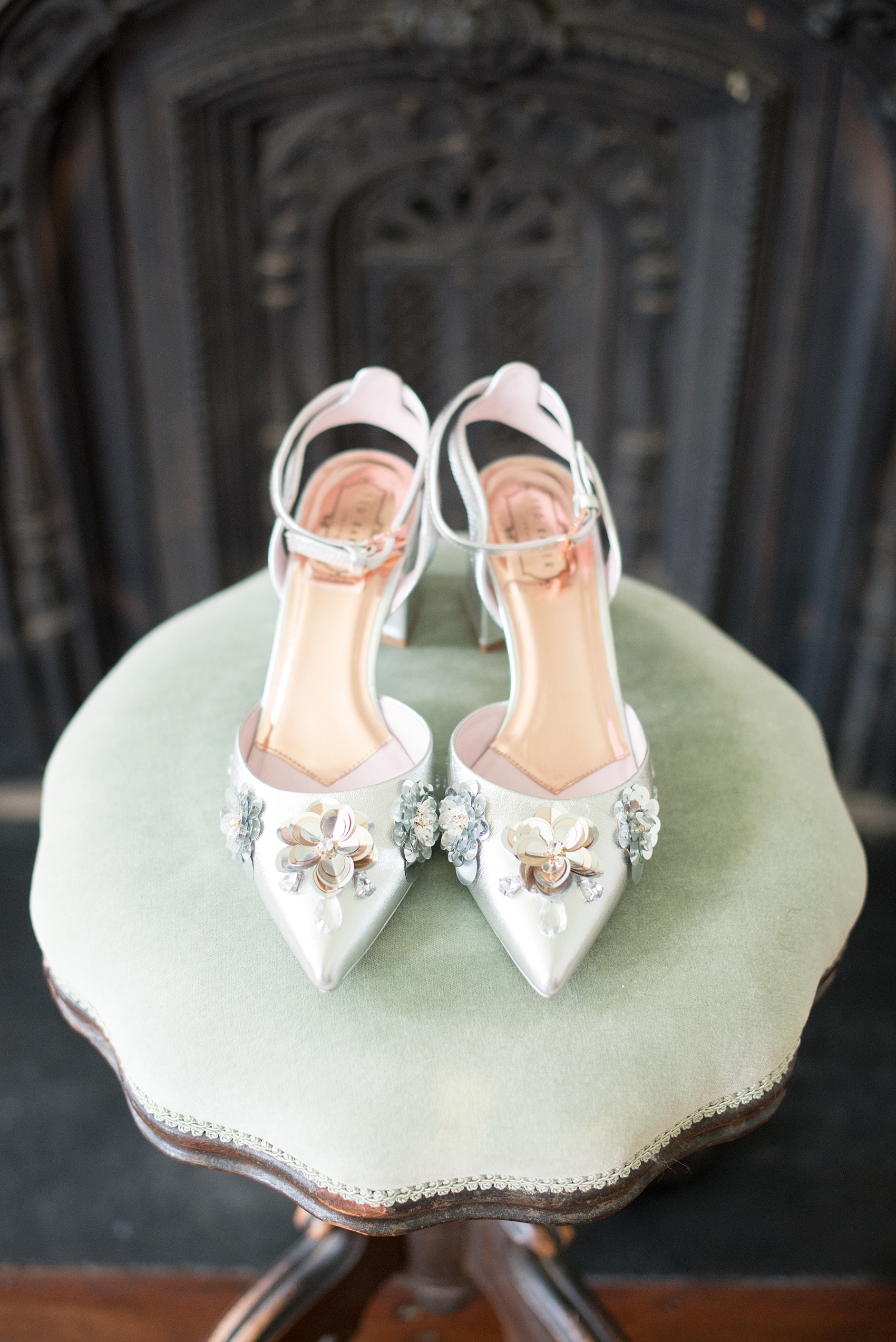 Mikkel Paige Photography photos from a Southwood Estate Wedding in Germantown, New York in the Hudson Valley. Picture of the bride's low heel silver bridal shoes with sequins.