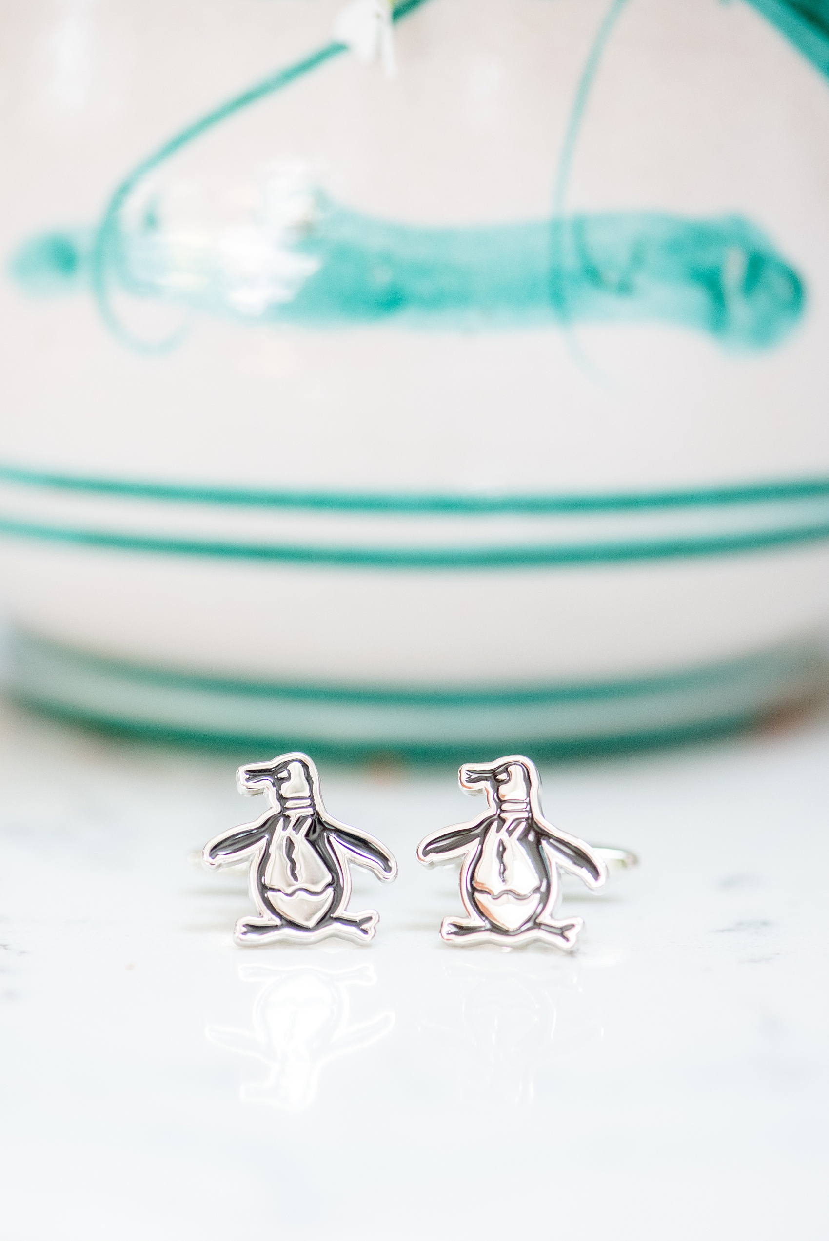 Mikkel Paige Photography photos from a Southwood Estate Wedding in Germantown, New York in the Hudson Valley. Picture of the penguin cufflinks the groom wore.