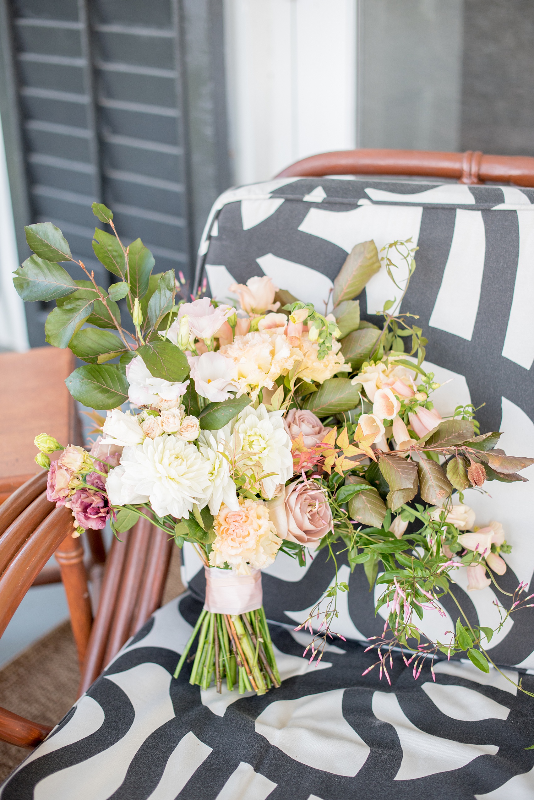 Mikkel Paige Photography photos from a Southwood Estate Wedding in Germantown, New York in the Hudson Valley. Picture of the bridal bouquet with muted earth tones.