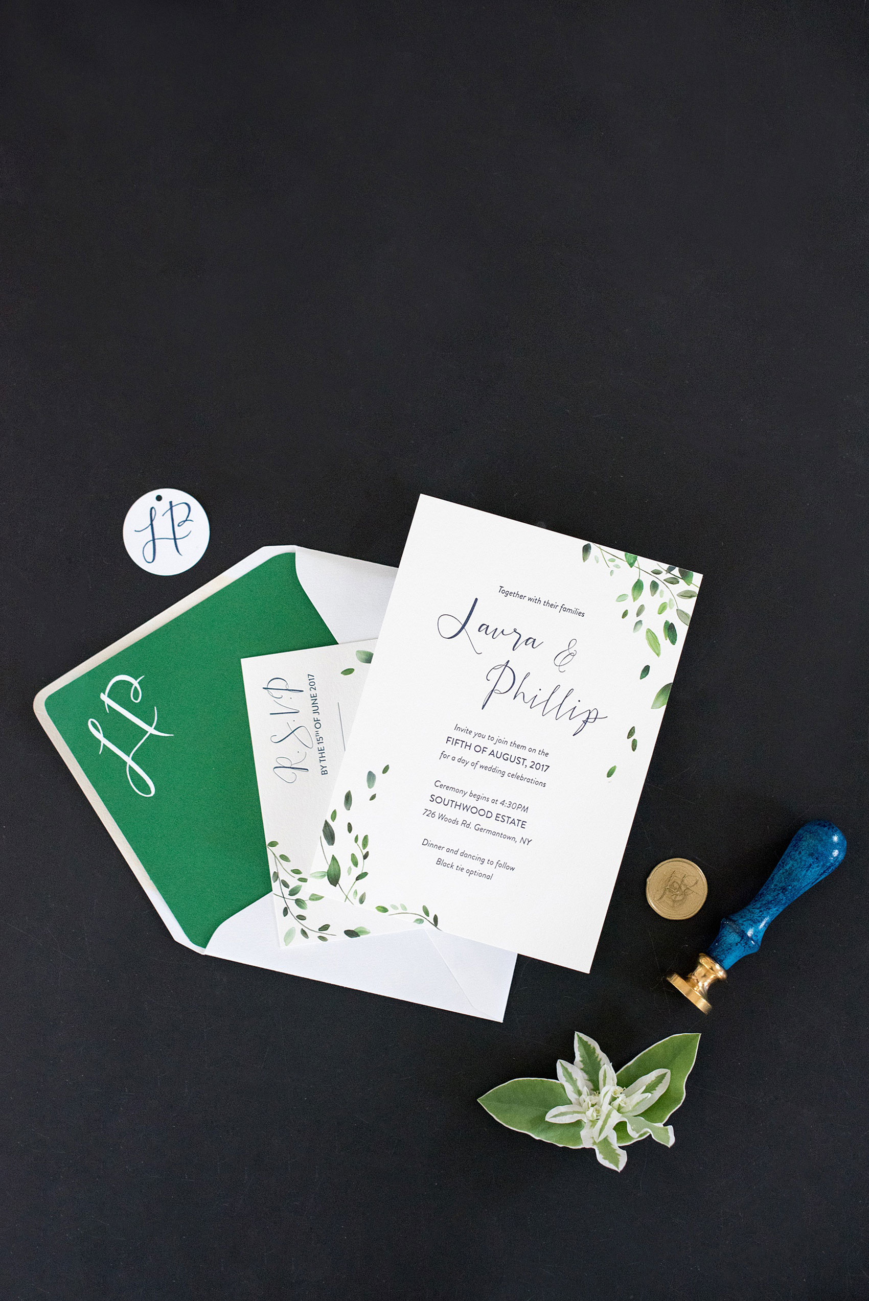 Mikkel Paige Photography photos from a Southwood Estate Wedding in Germantown, New York in the Hudson Valley. Picture of the invitation suite with green and white details.