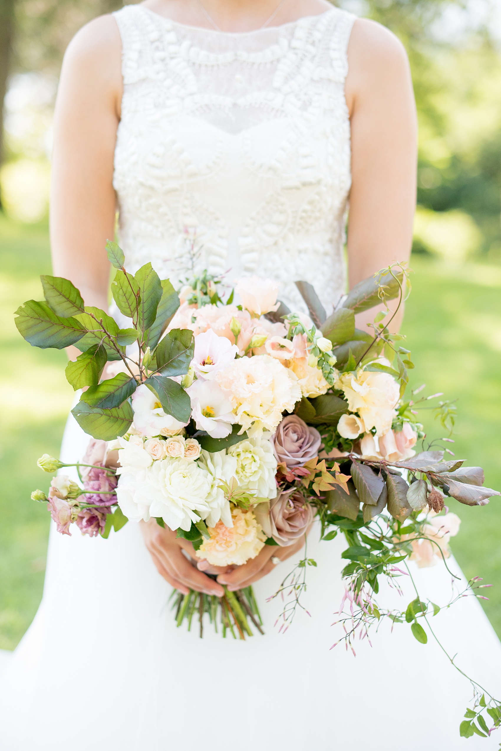 Mikkel Paige Photography photos from a Southwood Estate Wedding in Germantown, New York in the Hudson Valley. Picture of the bridal bouquet with muted earth tones.