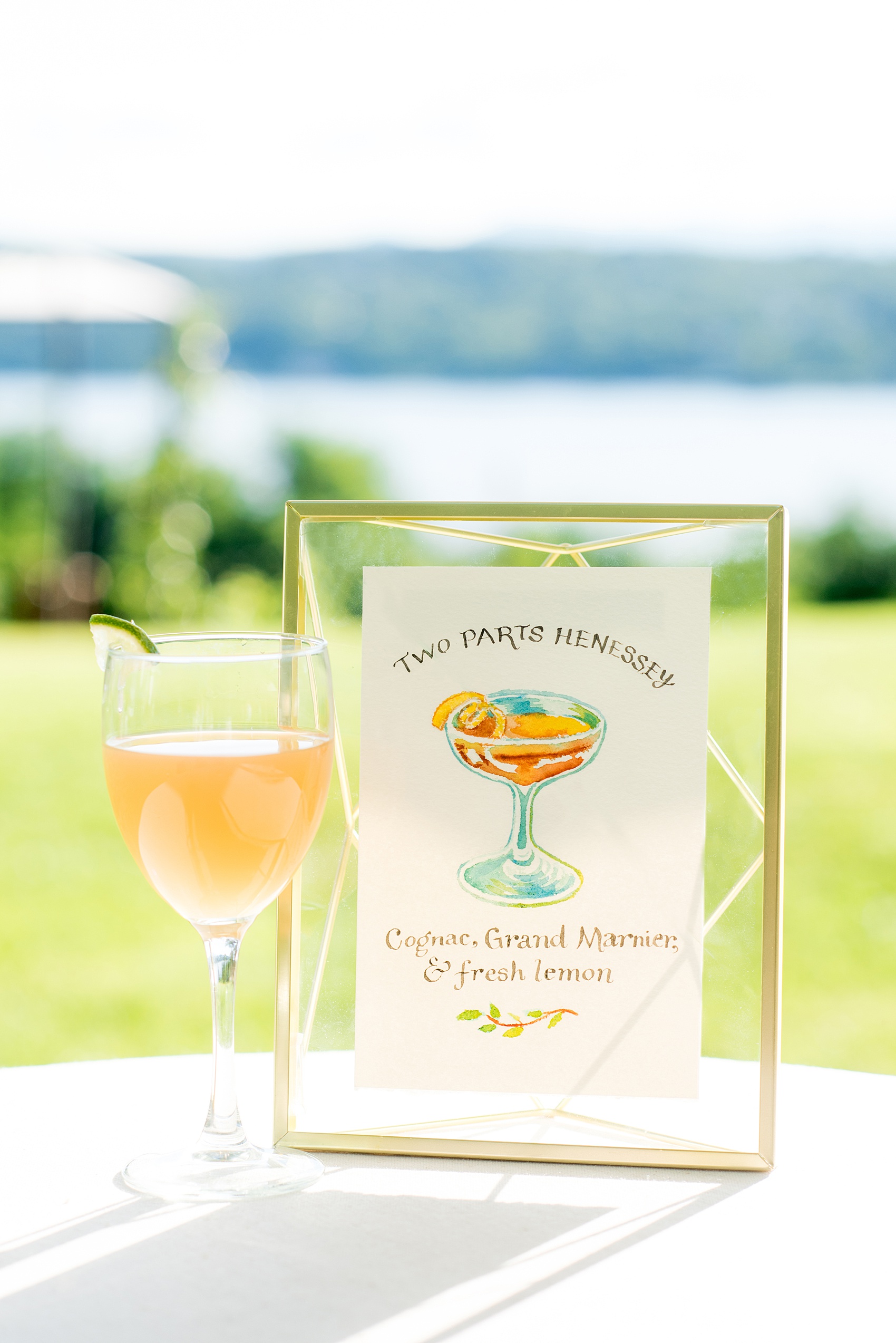 Mikkel Paige Photography photos from a Southwood Estate Wedding in Germantown, New York in the Hudson Valley. Picture of the custom watercolor sign for the signature cocktail.