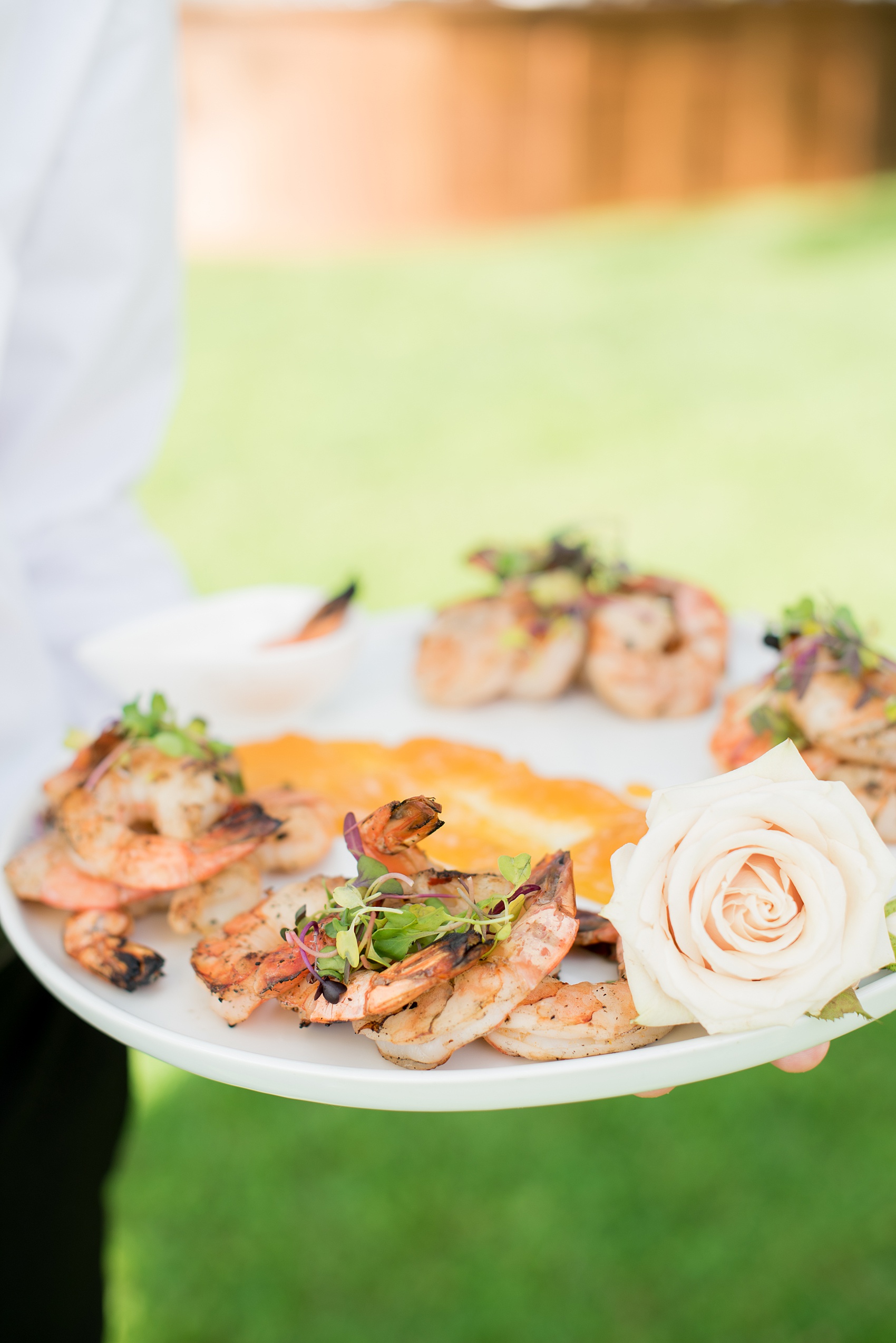 Mikkel Paige Photography photos from a Southwood Estate Wedding in Germantown, New York in the Hudson Valley. Picture of a shrimp passed hors d'oeuvre.