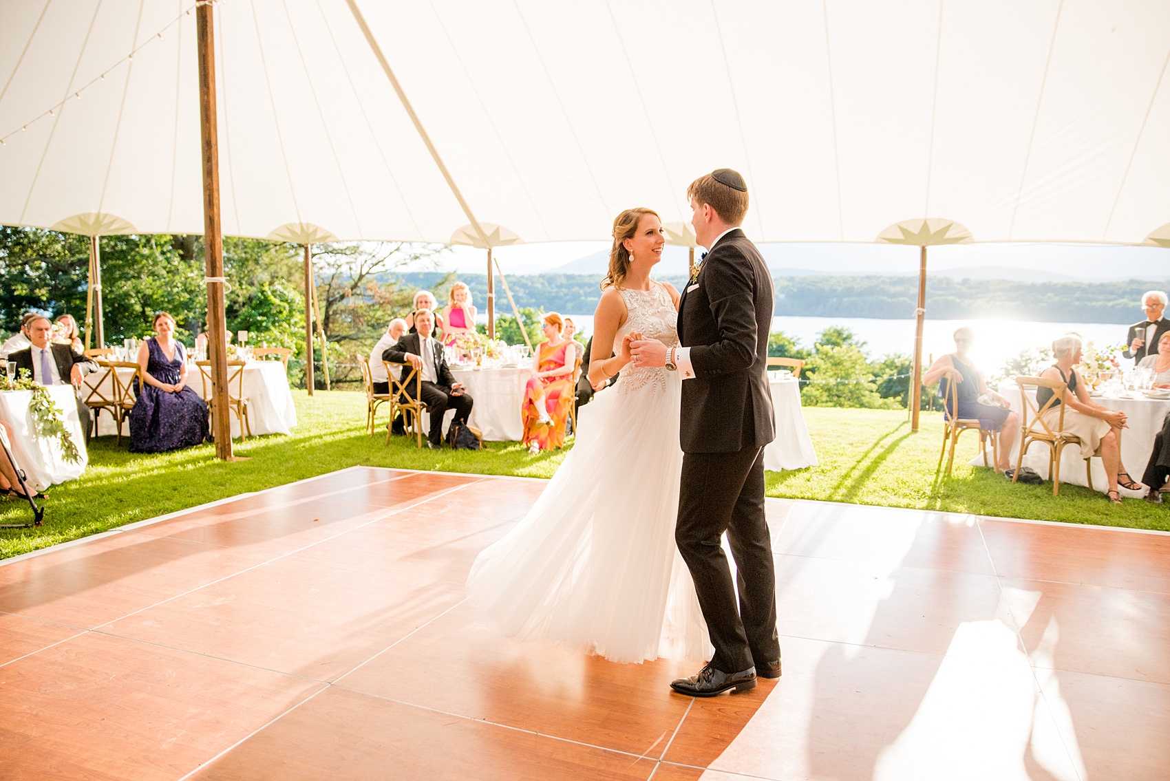 Mikkel Paige Photography photos from a Southwood Estate Wedding in Germantown, New York in the Hudson Valley. Picture of the bride and groom's first dance in their tented reception.