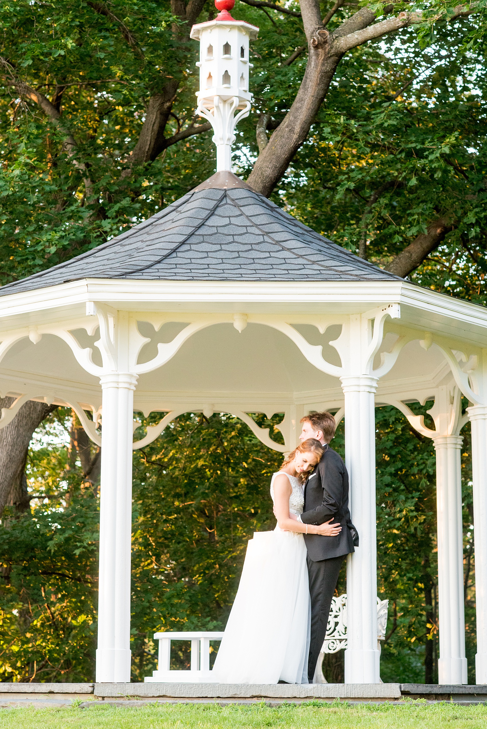 Mikkel Paige Photography photos from a Southwood Estate Wedding in Germantown, New York in the Hudson Valley. Golden hour photo of the bride and groom in a gazebo.