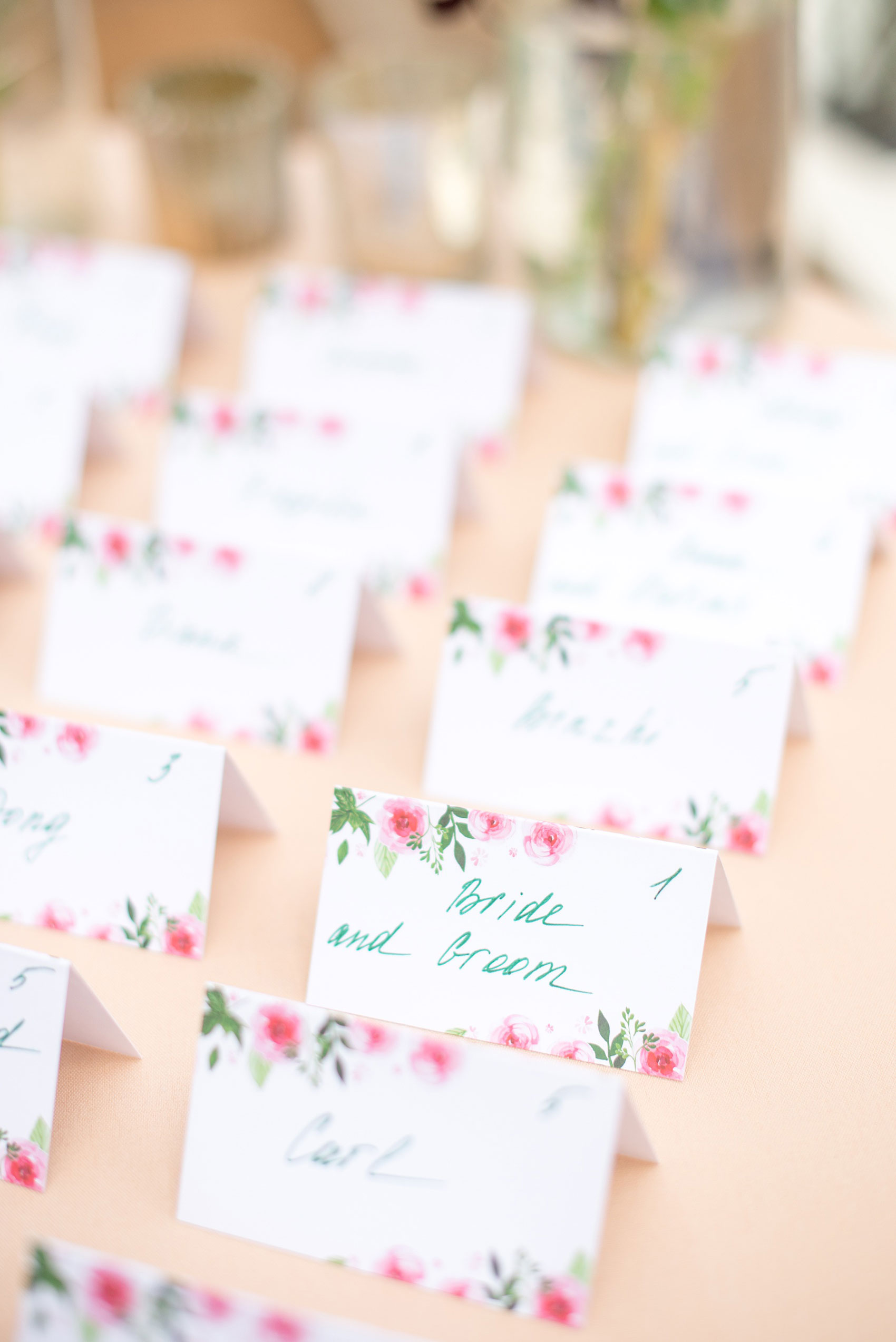 Mikkel Paige Photography photos of a wedding at Crabtree Kittle's House. Picture of the floral escort cards.