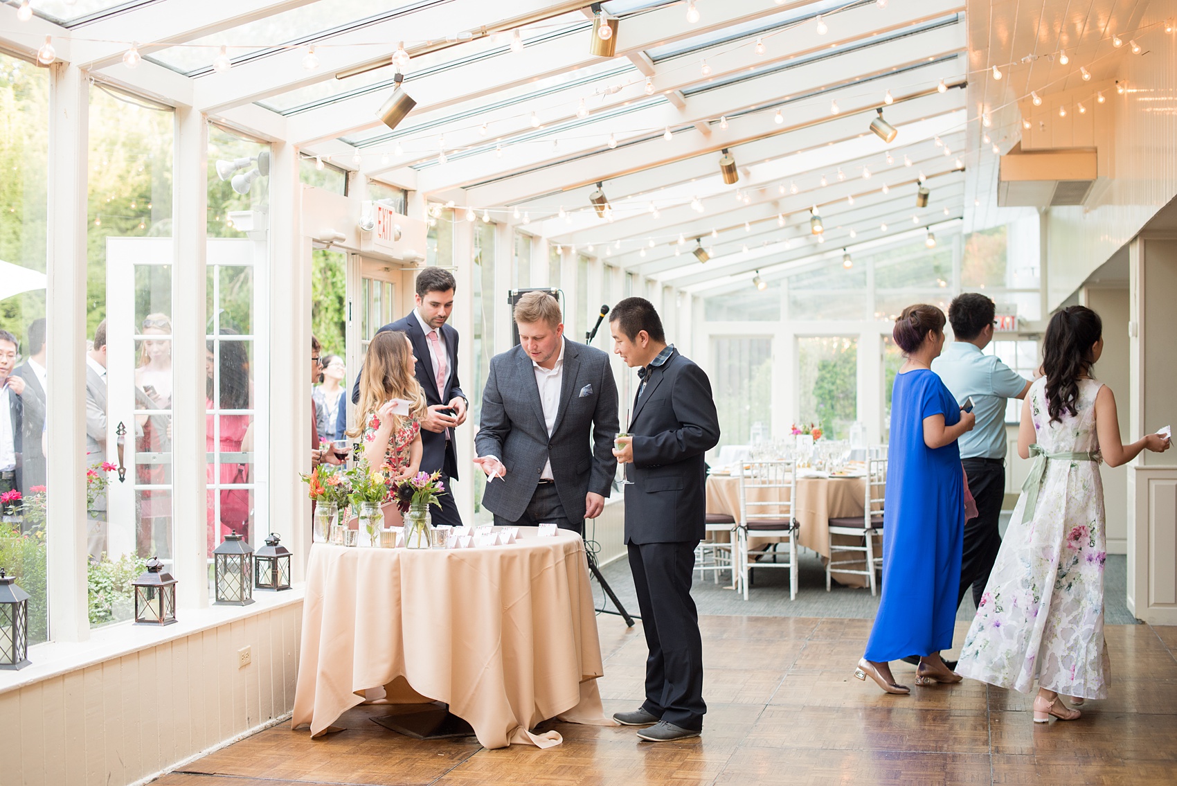 Mikkel Paige Photography photos of a wedding at Crabtree Kittle's House. Picture of the guests entering the reception area.