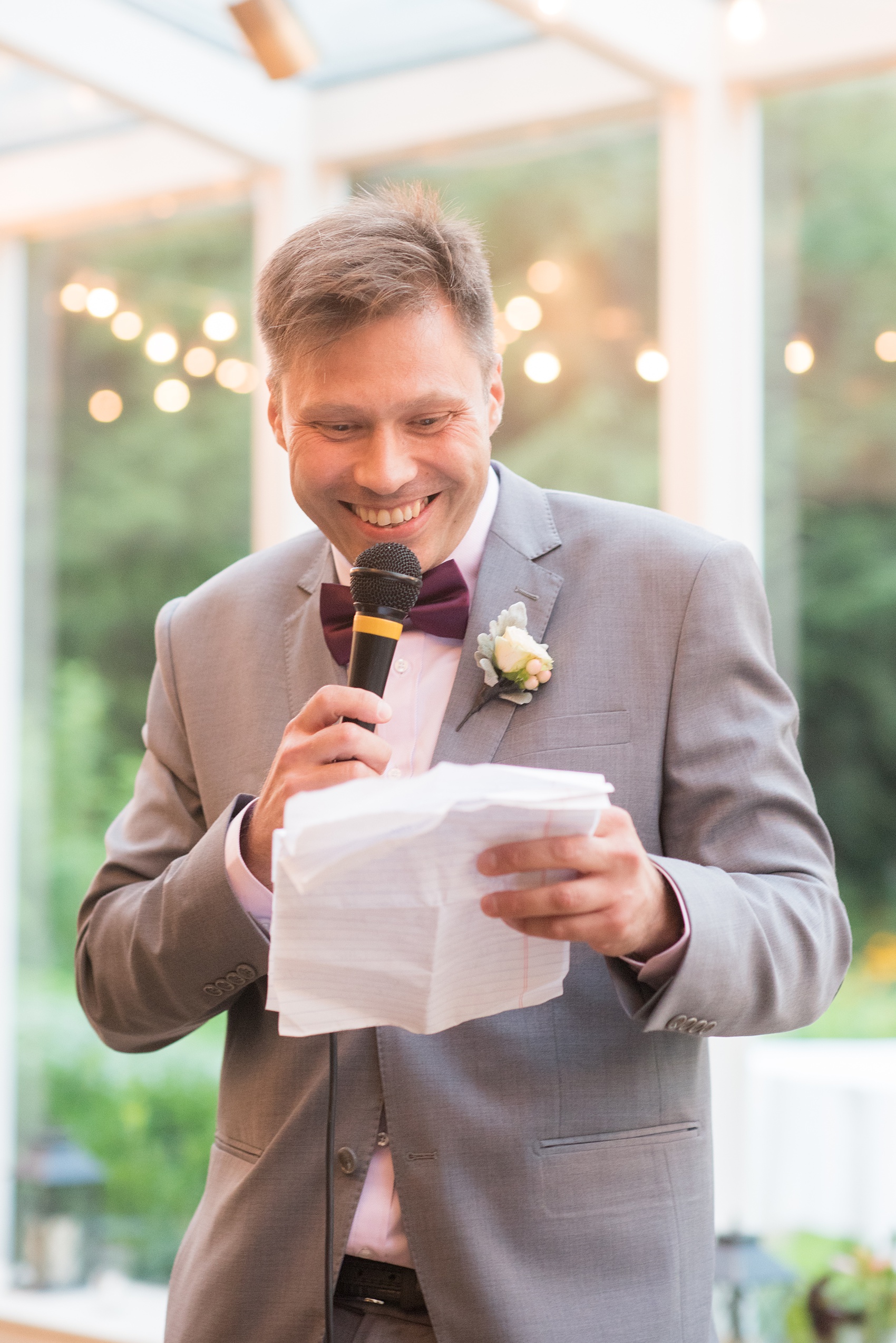 Mikkel Paige Photography photos of a wedding at Crabtree Kittle's House. Candid picture of the bride's father's speech.