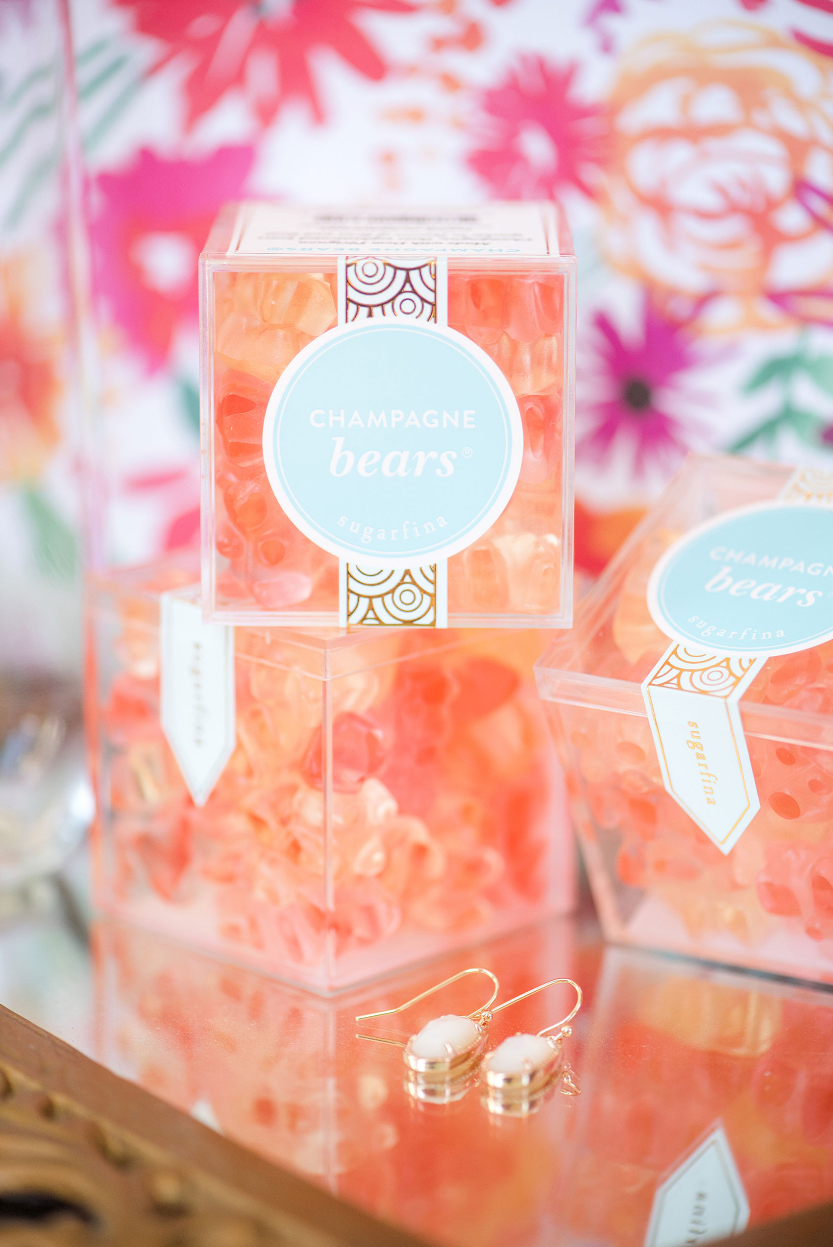 Mikkel Paige Photography pictures from a wedding at Merrimon-Wynne House in Raleigh, NC. Photo of the bridesmaids gift champagne gummy bears.