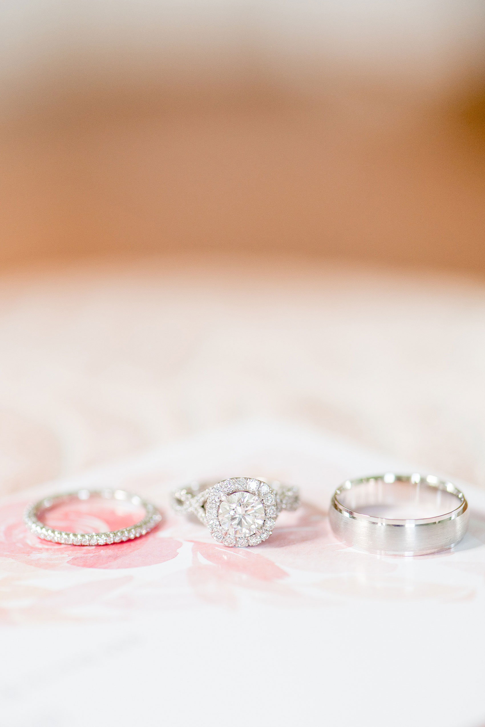 Mikkel Paige Photography pictures from a wedding at Merrimon-Wynne House in Raleigh, NC. Detail photo of the couples Tacori diamond rings.