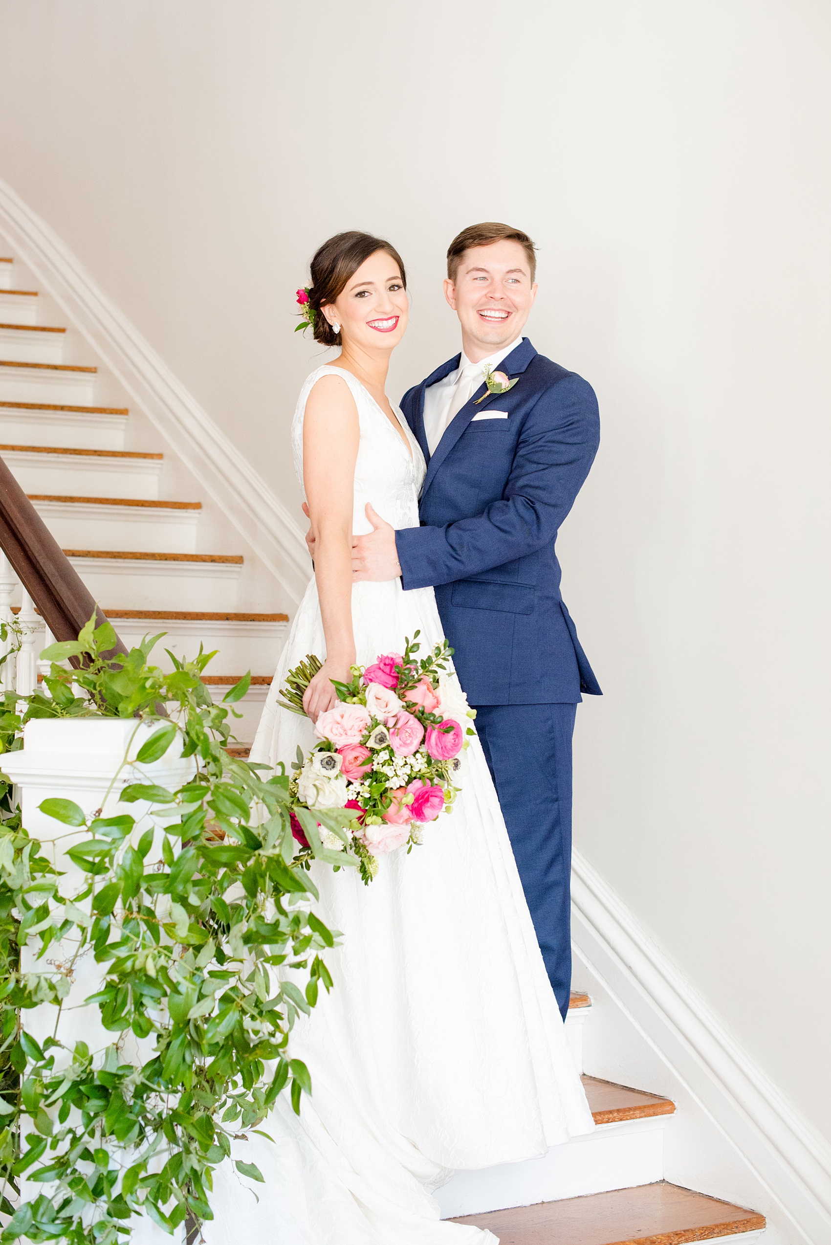 Mikkel Paige Photography pictures from a wedding at Merrimon-Wynne House in Raleigh, NC. Photo of the bride and groom on the stairs of the historic southern home.