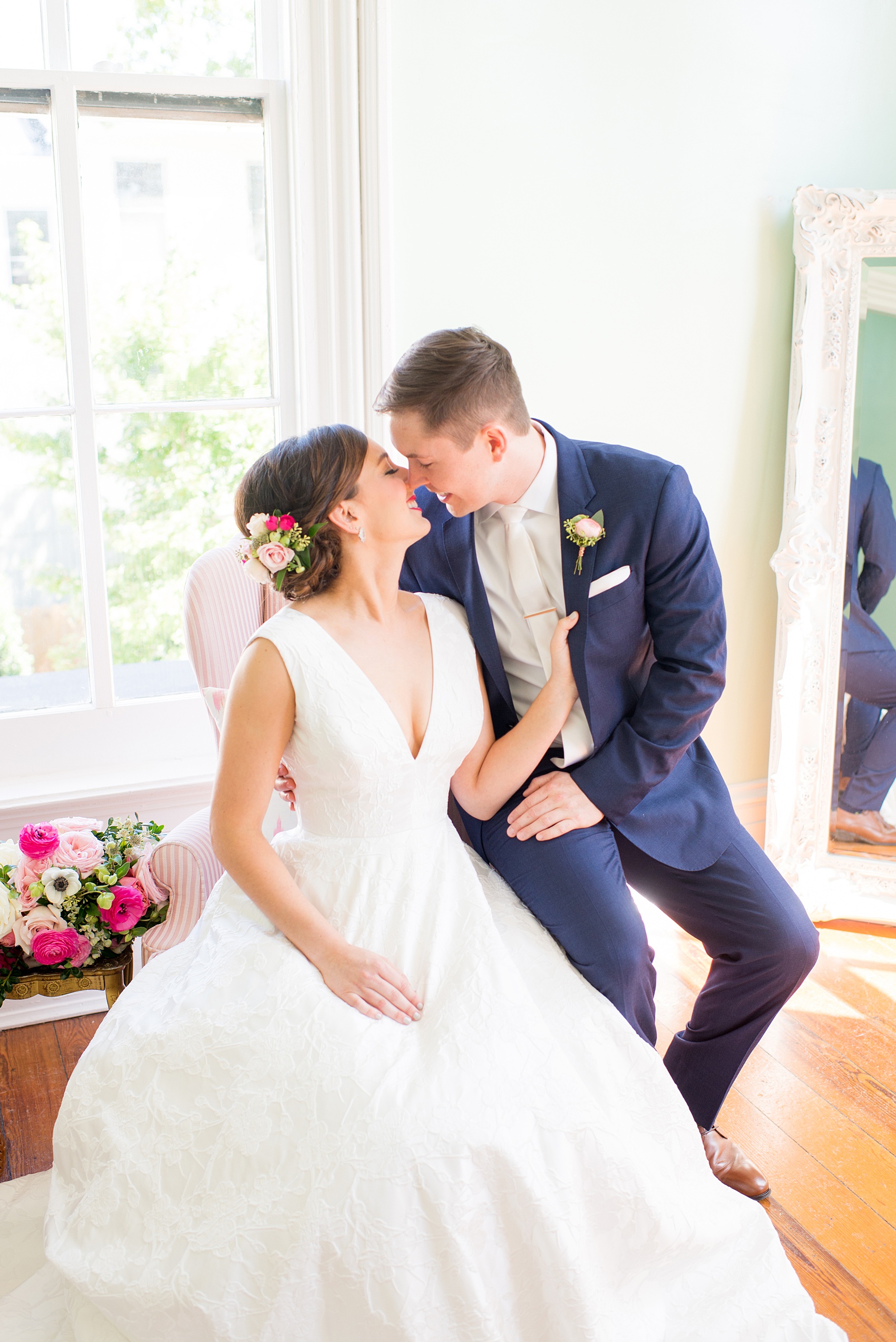 Mikkel Paige Photography pictures from a wedding at Merrimon-Wynne House in Raleigh, NC. Photo of the bride and groom in the bridal suite.