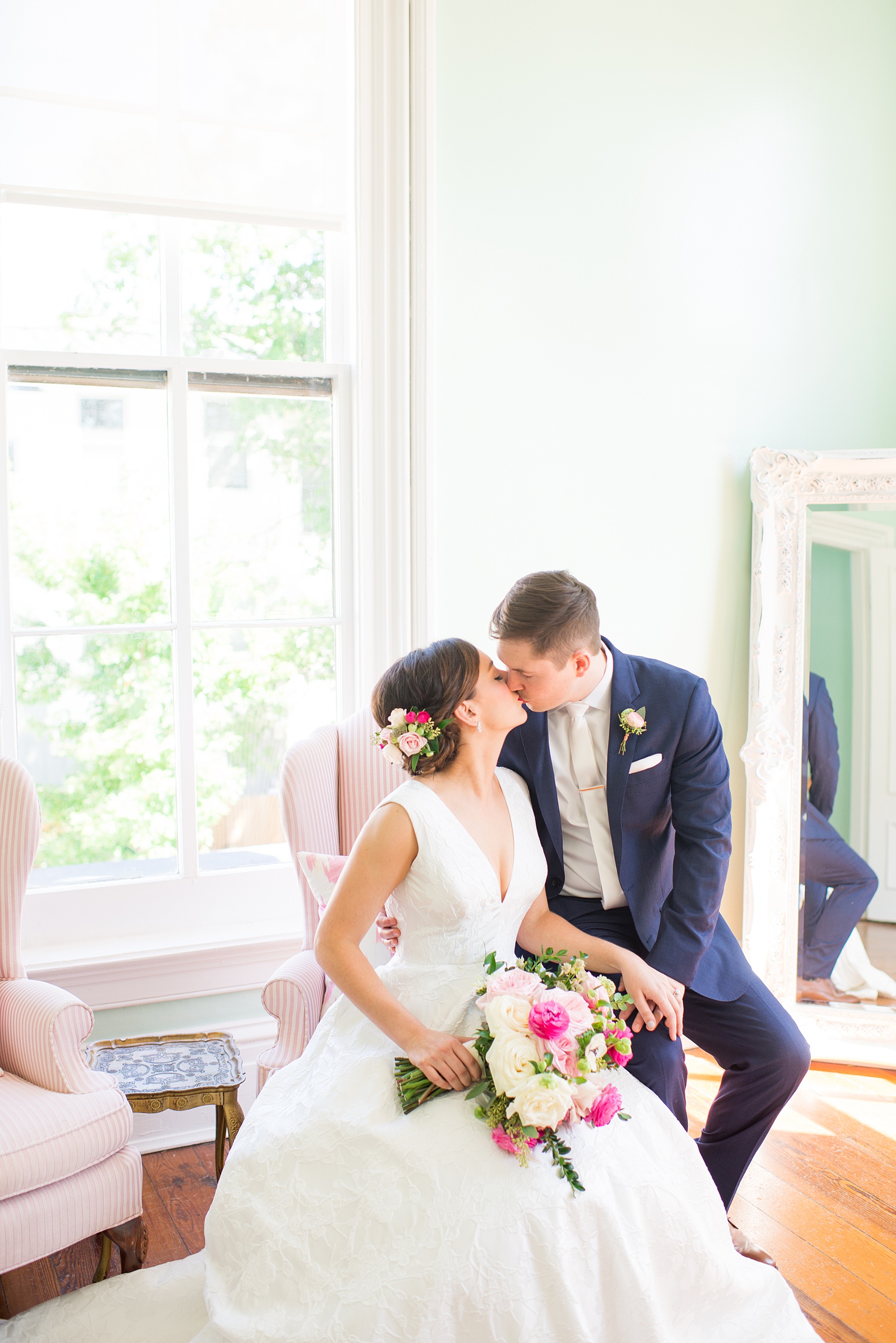 Mikkel Paige Photography pictures from a wedding at Merrimon-Wynne House in Raleigh, NC. Photo of the bride and groom in the bridal suite.