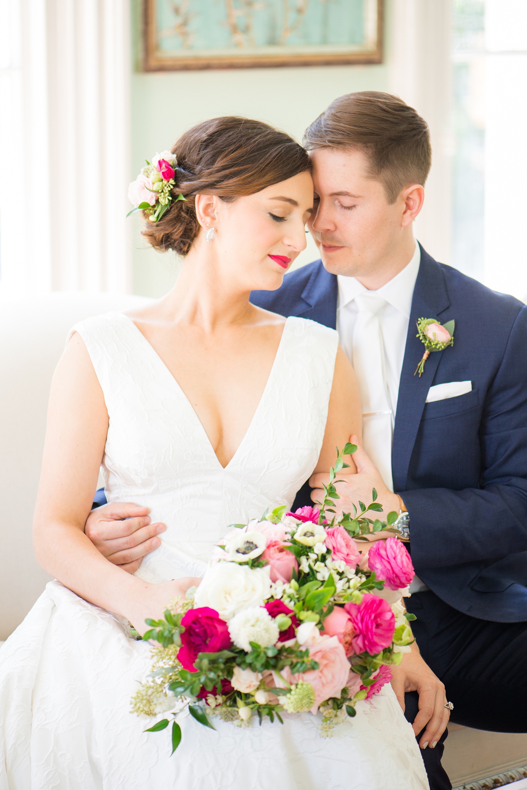 Mikkel Paige Photography pictures from a wedding at Merrimon-Wynne House in Raleigh, NC. Photo of the bride and groom in the bridal suite.