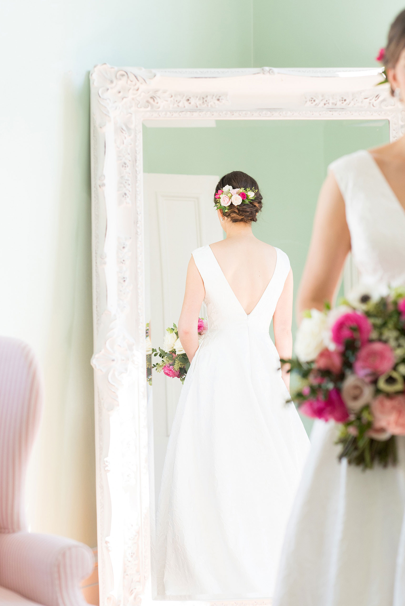 Mikkel Paige Photography pictures from a wedding at Merrimon-Wynne House in Raleigh, NC. Photo of the back of the bride's Kate McDonald dress.