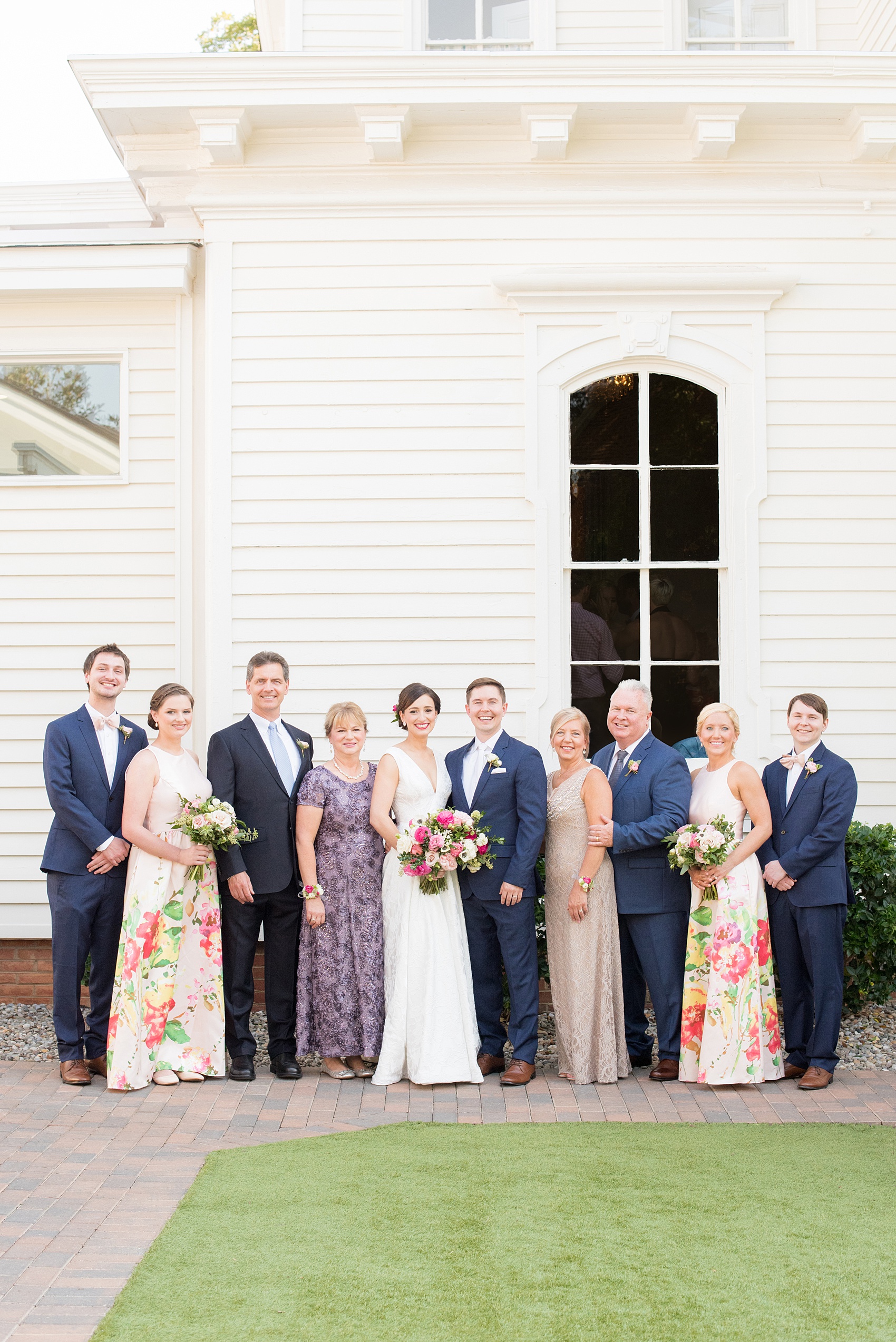 Mikkel Paige Photography pictures from a wedding at Merrimon-Wynne House in Raleigh, NC. Photo of the bride and groom's families.