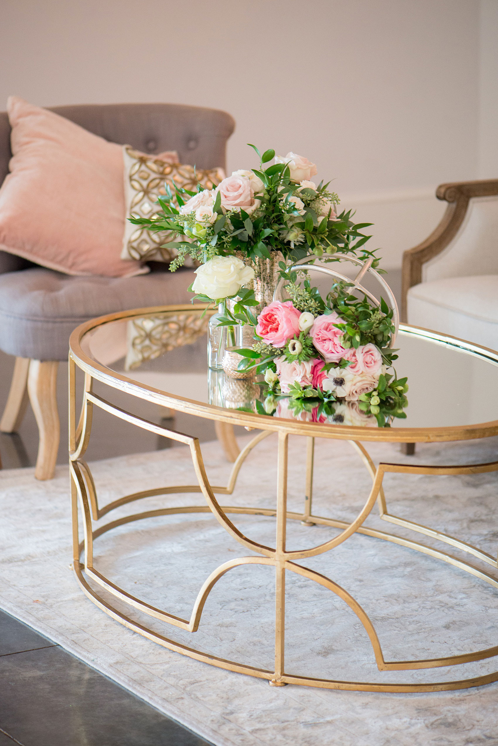 Mikkel Paige Photography pictures from a wedding at Merrimon-Wynne House in Raleigh, NC. Photo of the lounge coffee table inside the reception dancing area.