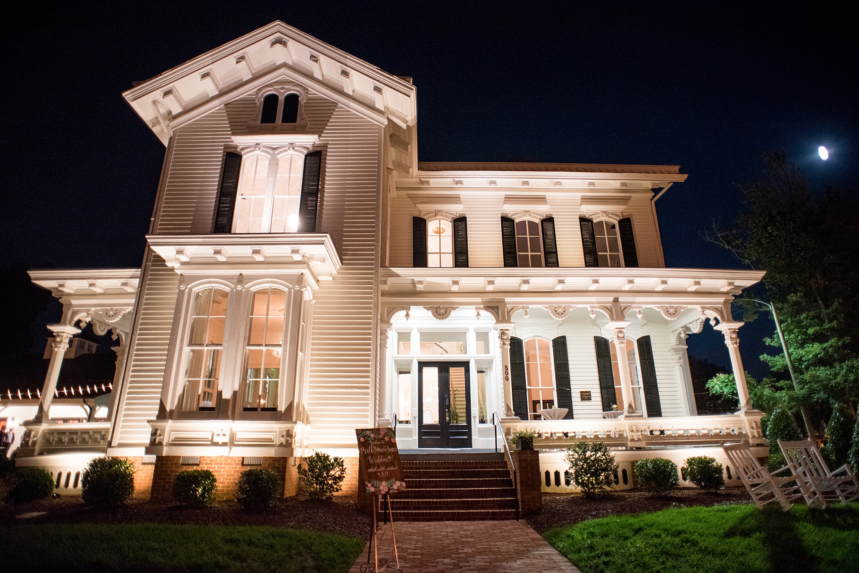 Mikkel Paige Photography pictures from a wedding at Merrimon-Wynne House in Raleigh, NC. Photo of historic home at night.