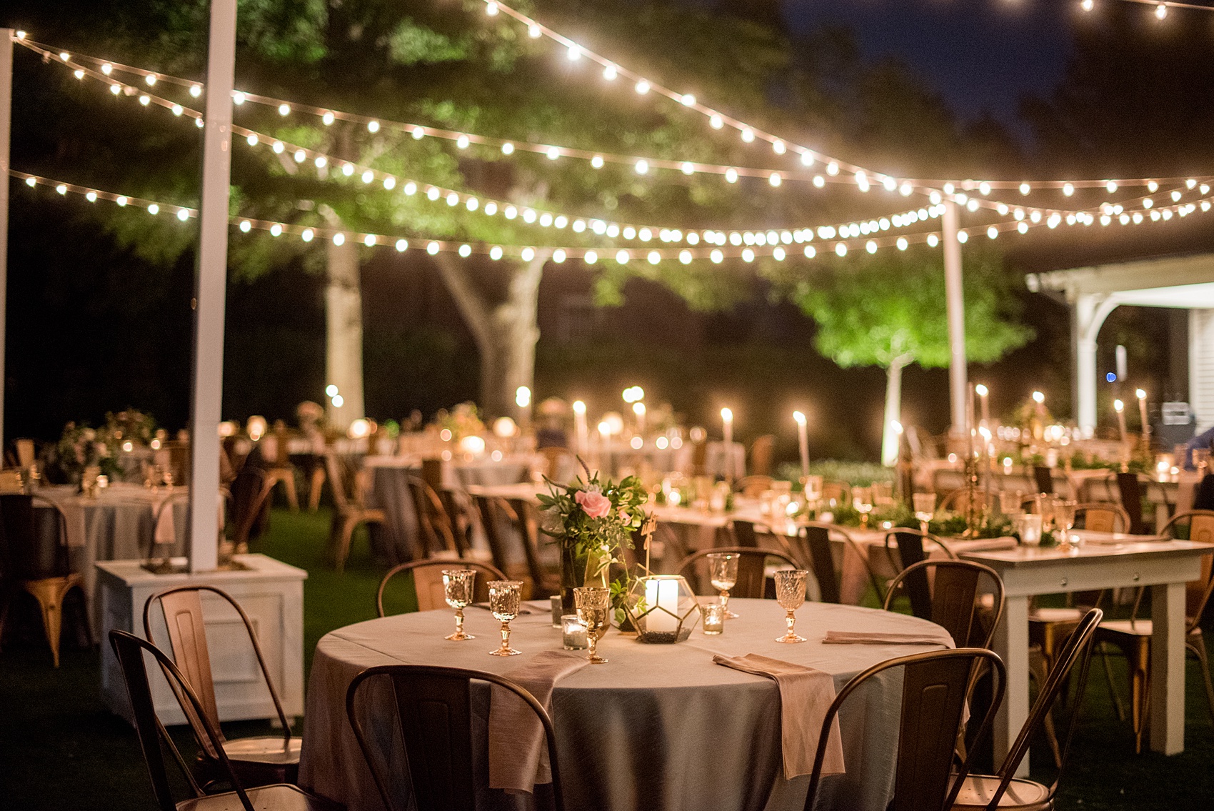 Mikkel Paige Photography pictures from a wedding at Merrimon-Wynne House in Raleigh, NC. Photo of the reception in the evening.