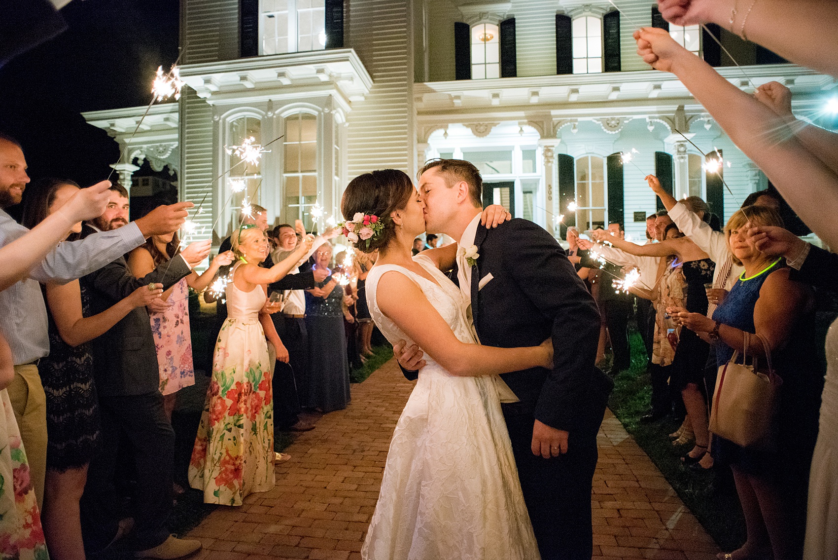 Mikkel Paige Photography pictures from a wedding at Merrimon-Wynne House in Raleigh, NC. Photo of the bride and groom's sparkler exit.