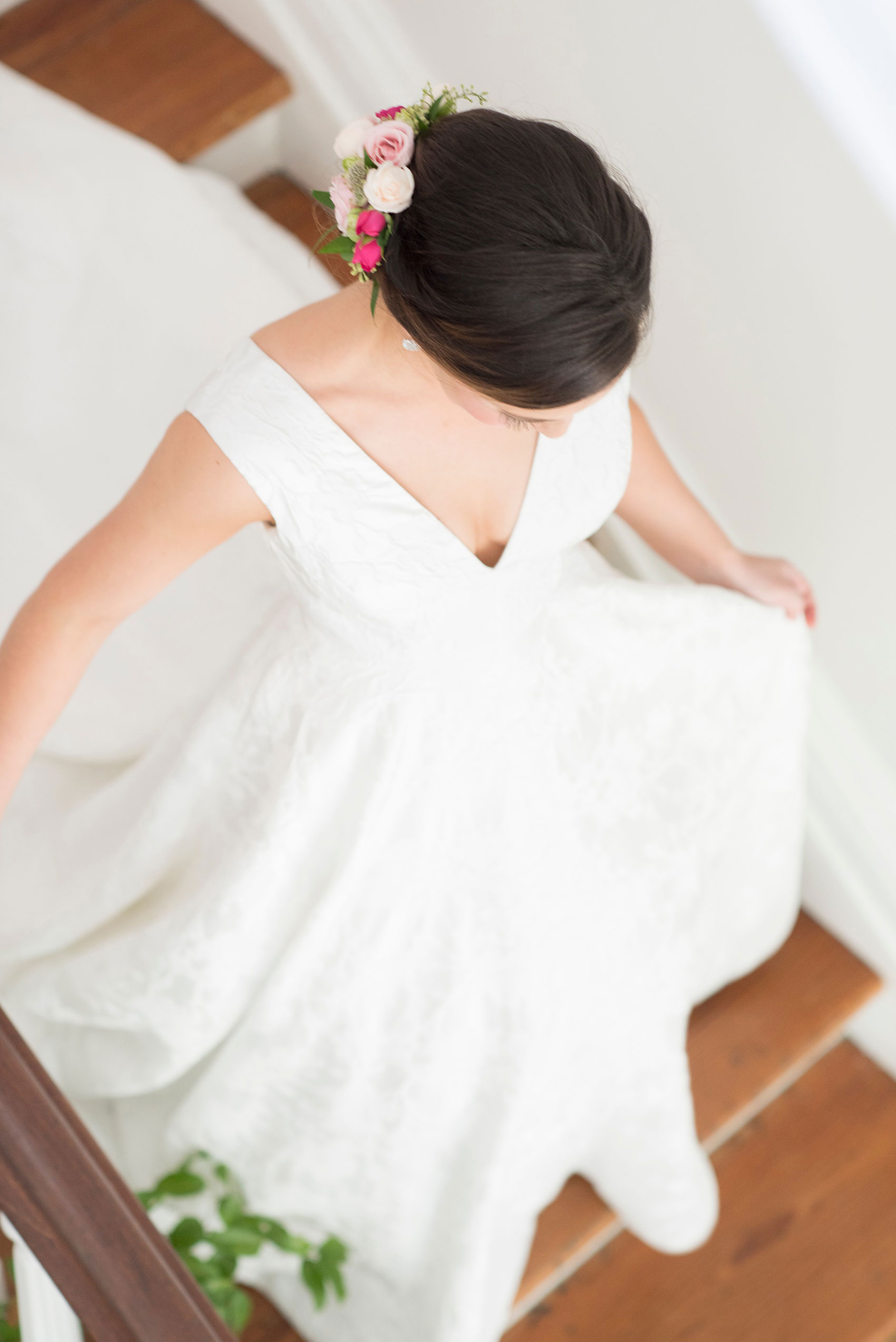 Mikkel Paige Photography pictures from a Merrimon-Wynne House wedding in Raleigh, NC. Photo of the bride walking down the stairs.