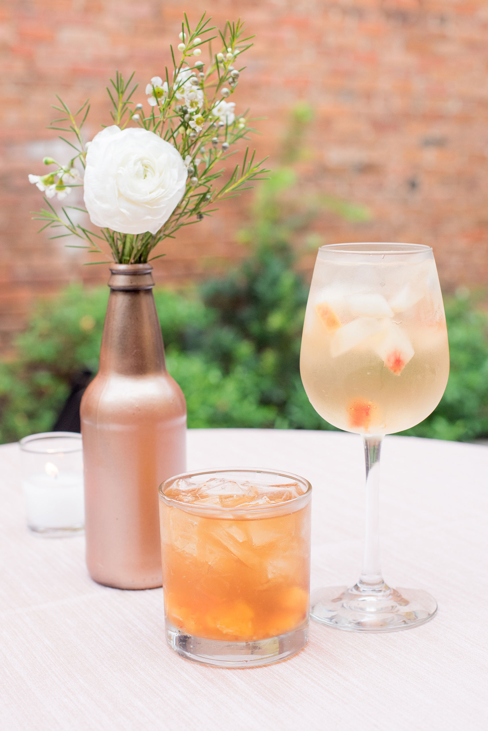 Mikkel Paige Photography photos from a downtown Raleigh wedding rehearsal dinner at Sitti restaurant. Picture of the specialty cocktails, White Sangria and an Old Fashioned. 