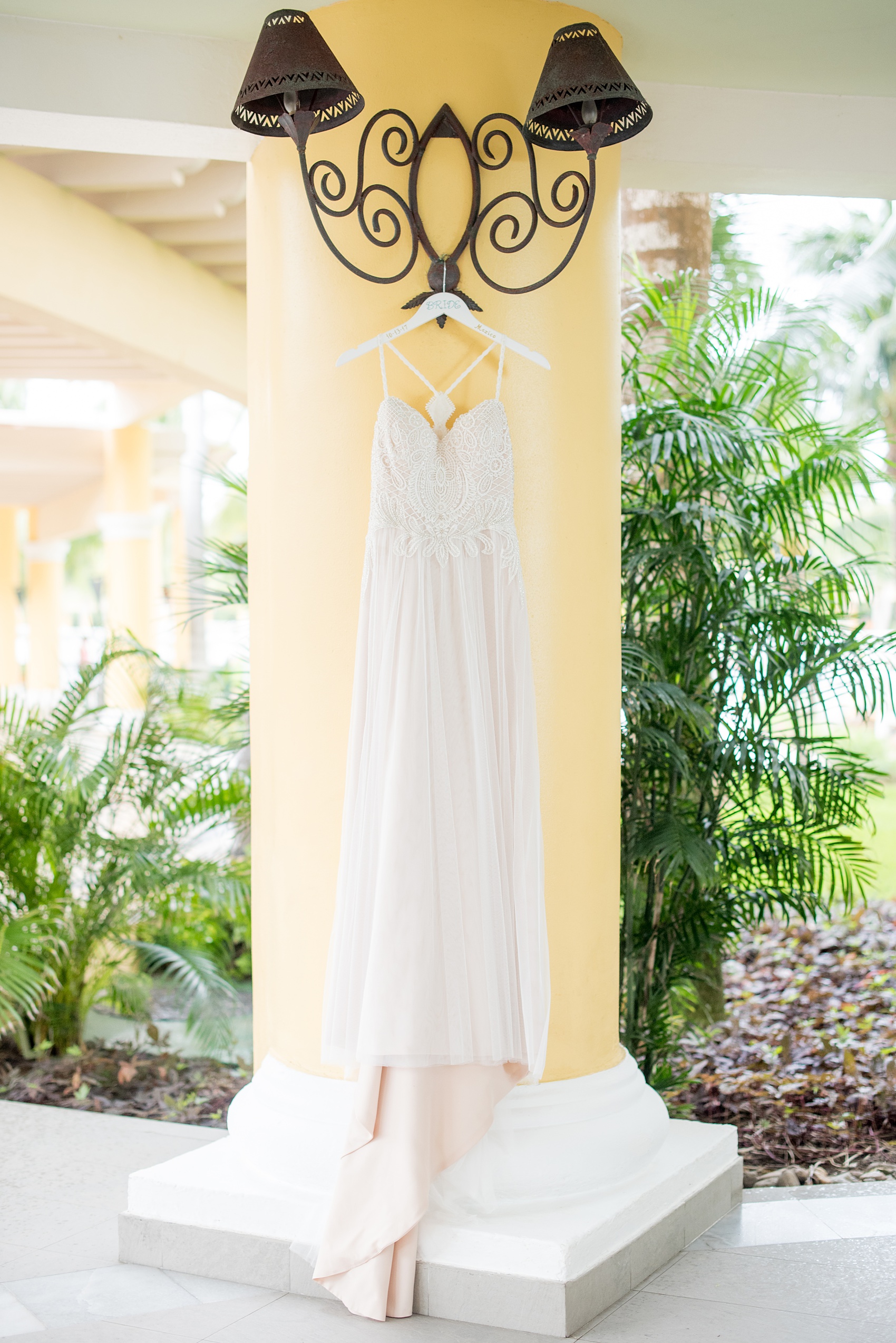 Mikkel Paige Photography photos from a wedding at Grand Paraiso, Mexico, Playa del Carmen Iberostar resort. Picture of the bride's beach gown.