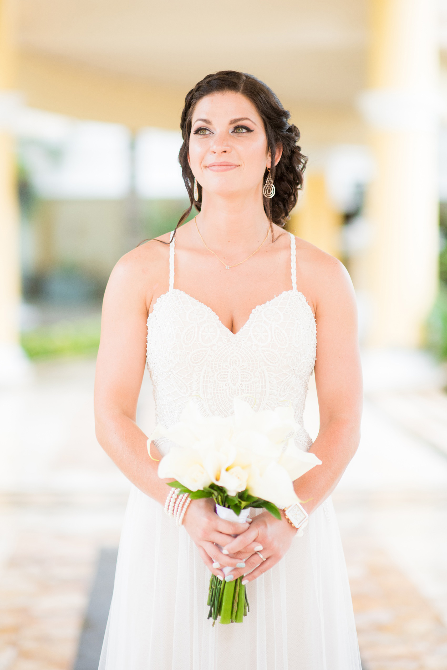 Mikkel Paige Photography photos from a wedding at Grand Paraiso, Mexico, Playa del Carmen Iberostar resort. Picture of the bride in her beach dress with tulle skirt.