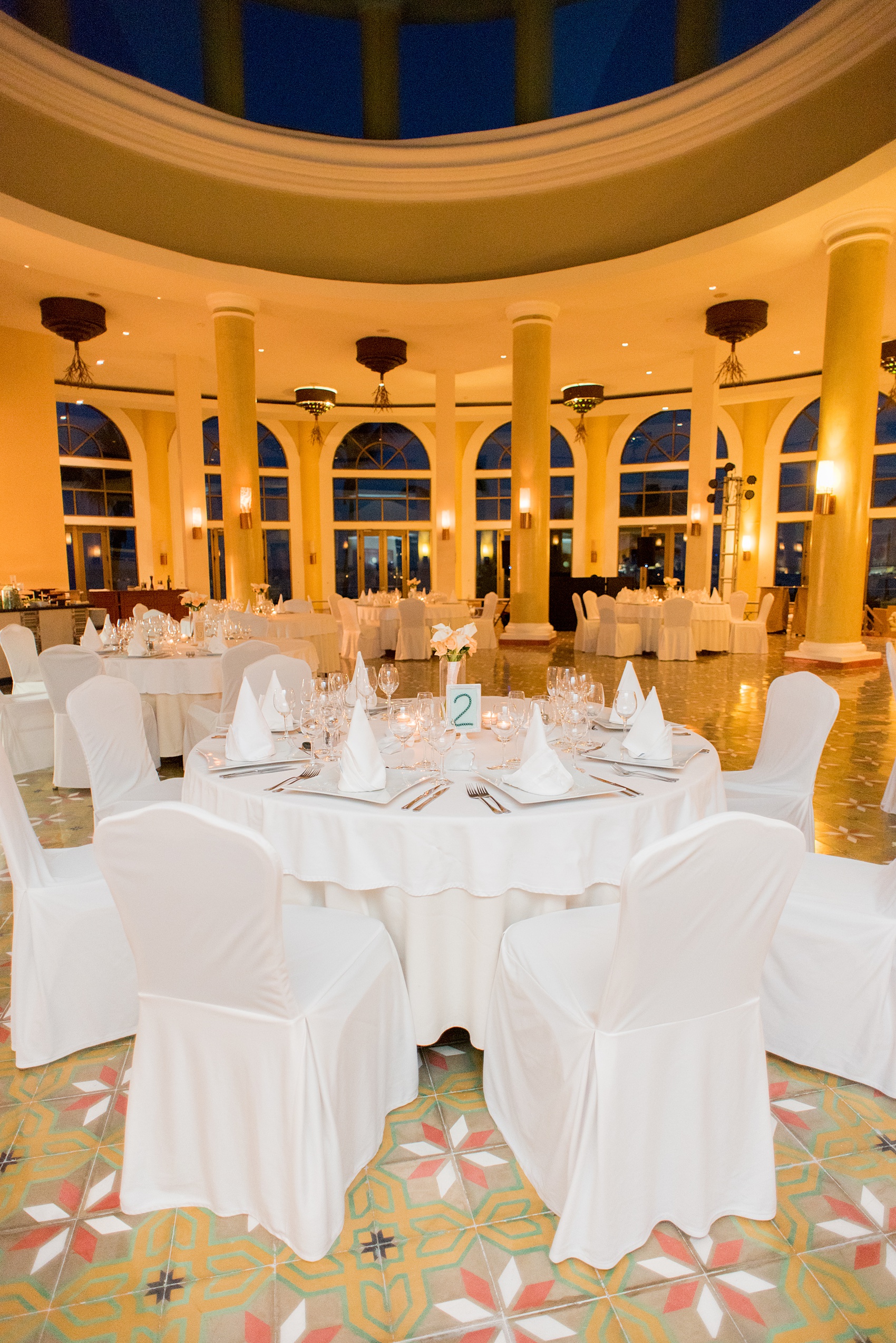 Mikkel Paige Photography photos from a wedding at Grand Paraiso, Mexico, Playa del Carmen Iberostar resort. Picture of the reception room setup.