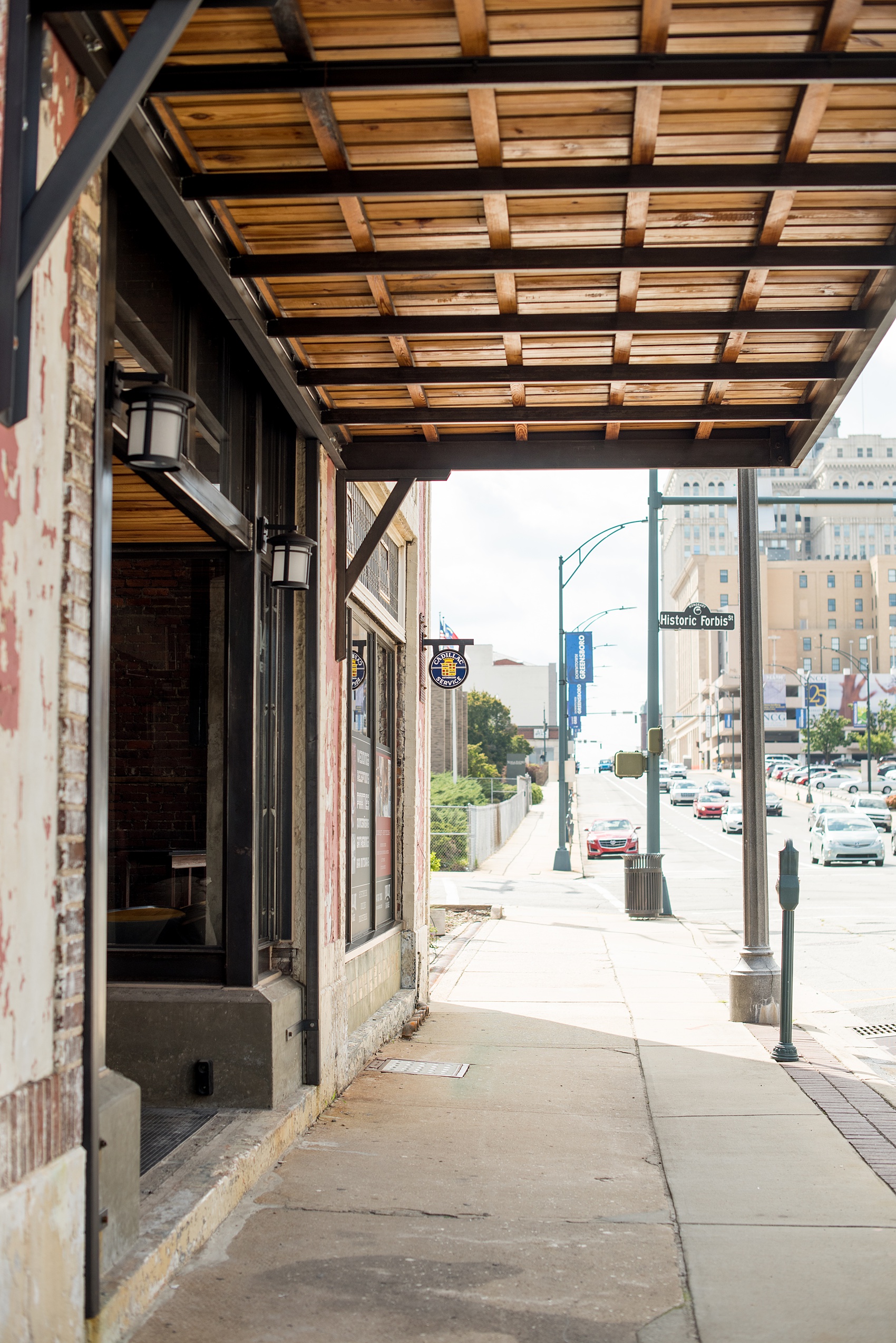 Mikkel Paige Photography pictures of Cadillac Service Garage venue in Greensboro, North Carolina. Photo of the exterior front entrance of the historic location.