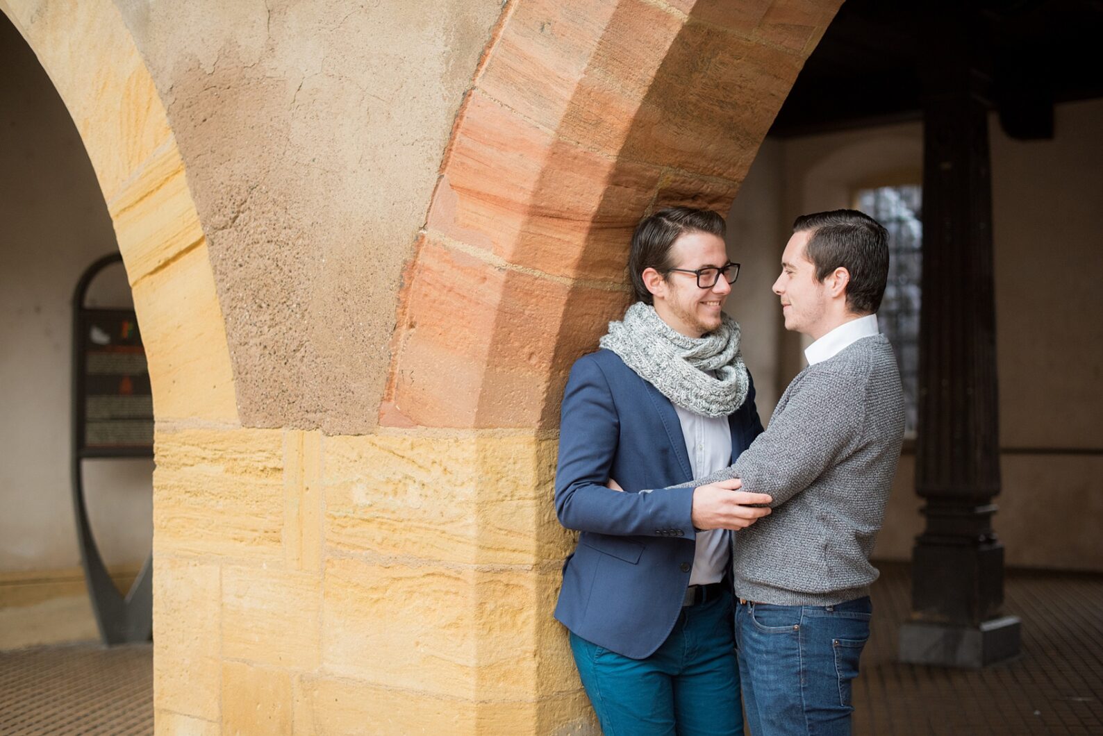 Mikkel Paige Photography pictures of an engagement session in Colmar, France in the Alsace region. Photo of the same sex/gay couple in the colorful, historic village.