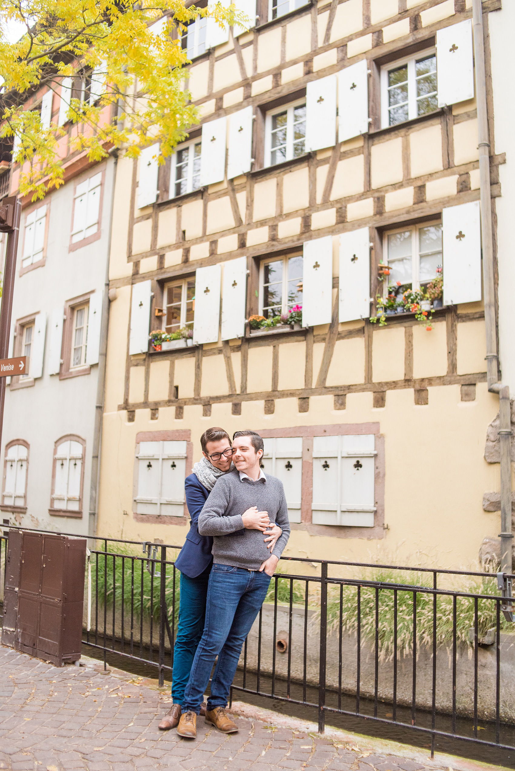 Mikkel Paige Photography pictures of an engagement session in Colmar, France in the Alsace region. Photo of a same sex couple in the historic city center.