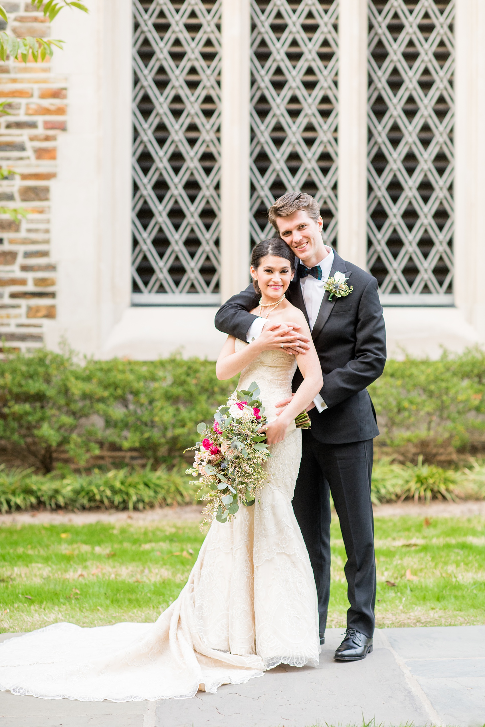 Mikkel Paige Photography photo of a wedding in Chapel Hill at Duke Chapel. A picture of the bride and groom with the gothic architecture. 