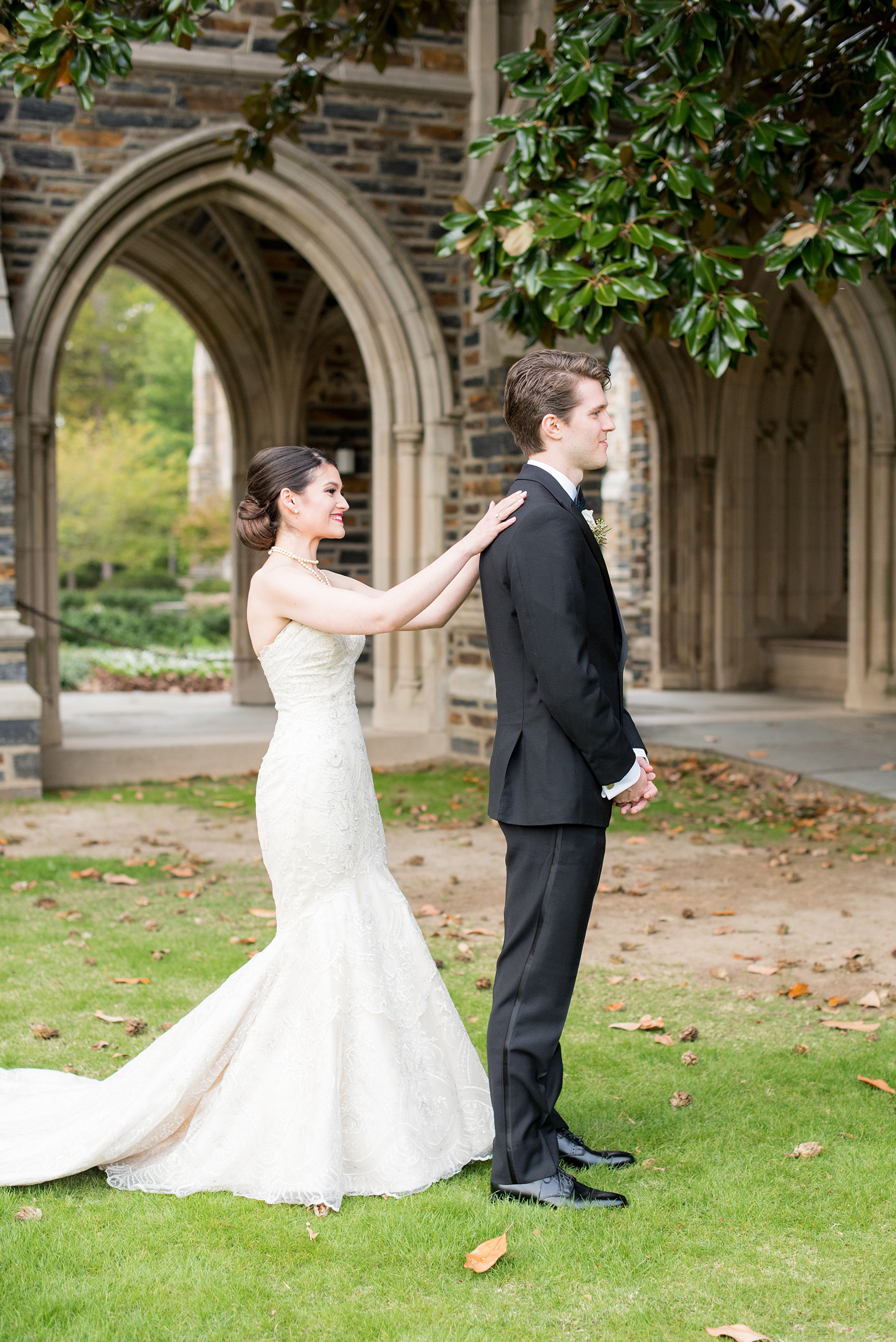 Mikkel Paige Photography photo of a wedding in Chapel Hill at Duke Chapel. Bride and groom with the gothic architecture. A picture the couple sharing their first look.