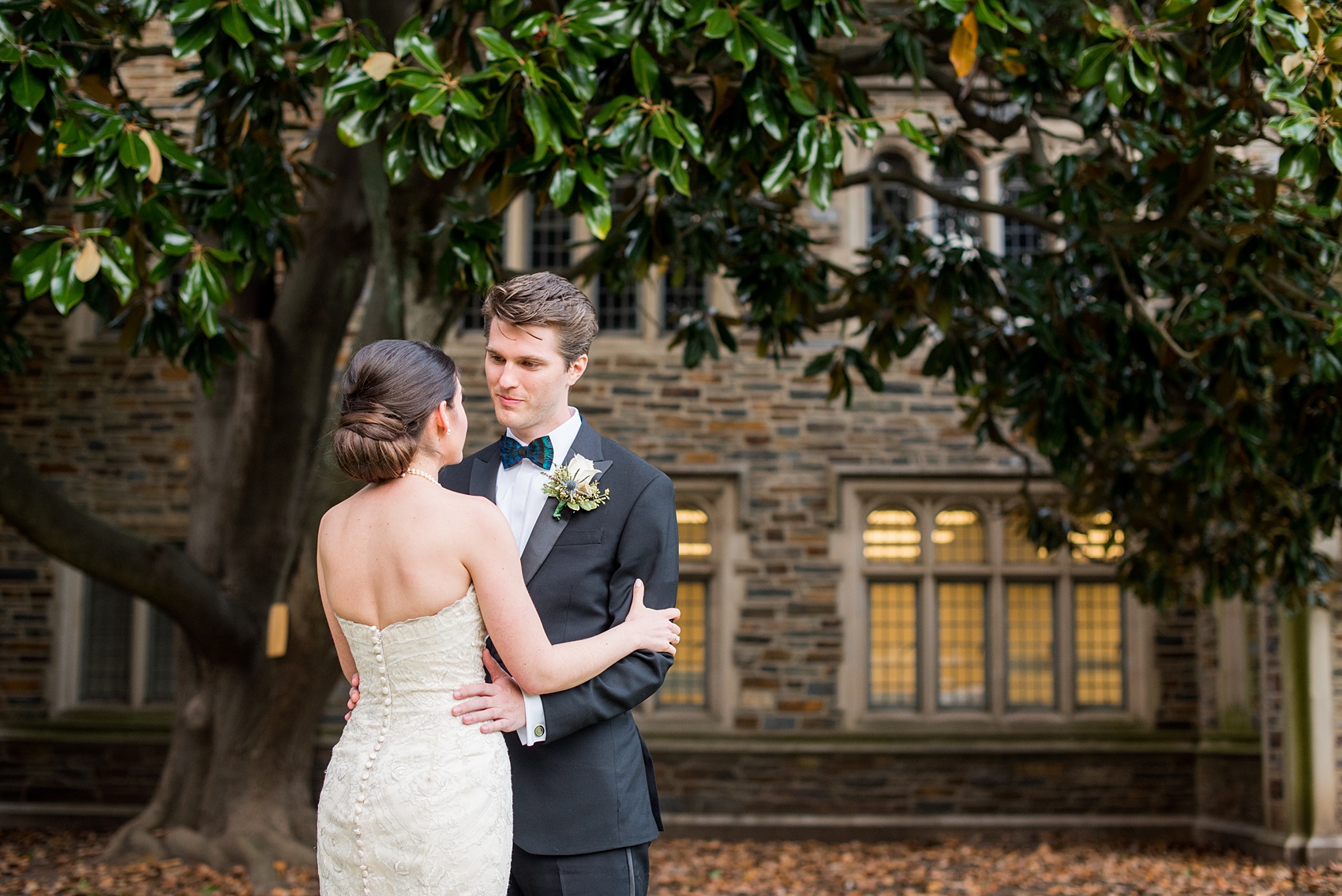 Mikkel Paige Photography photo of a wedding in Chapel Hill at Duke Chapel. Bride and groom with the gothic architecture. A picture the couple sharing their first look.