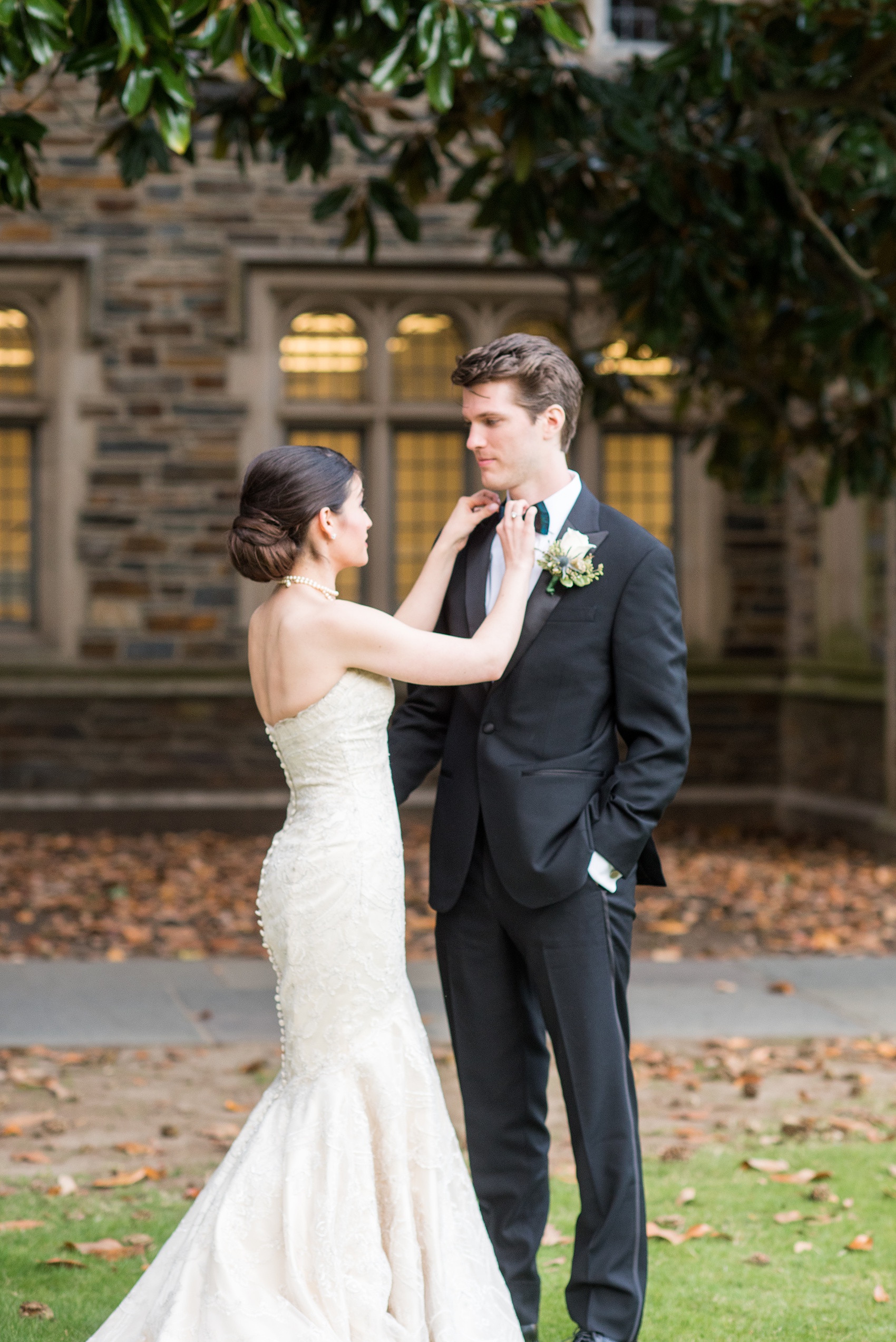 Mikkel Paige Photography photo of a wedding in Chapel Hill at Duke Chapel. Bride and groom with the gothic architecture. A picture the couple sharing their first look.