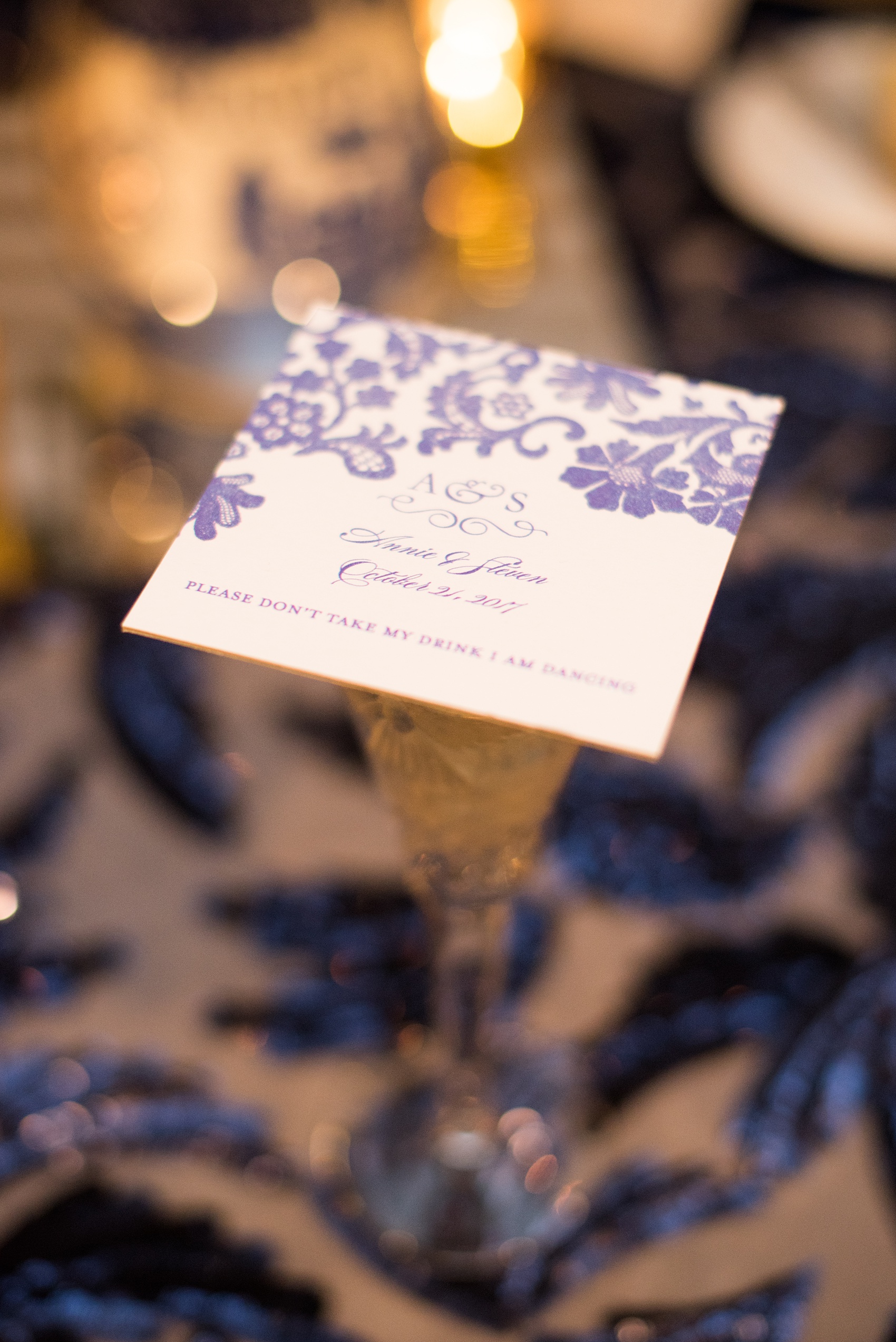 Mikkel Paige Photography photo of a wedding reception at Hope Valley Country Club in Chapel Hill, NC. Picture of the drink coaster that doubled as a drink reserve.