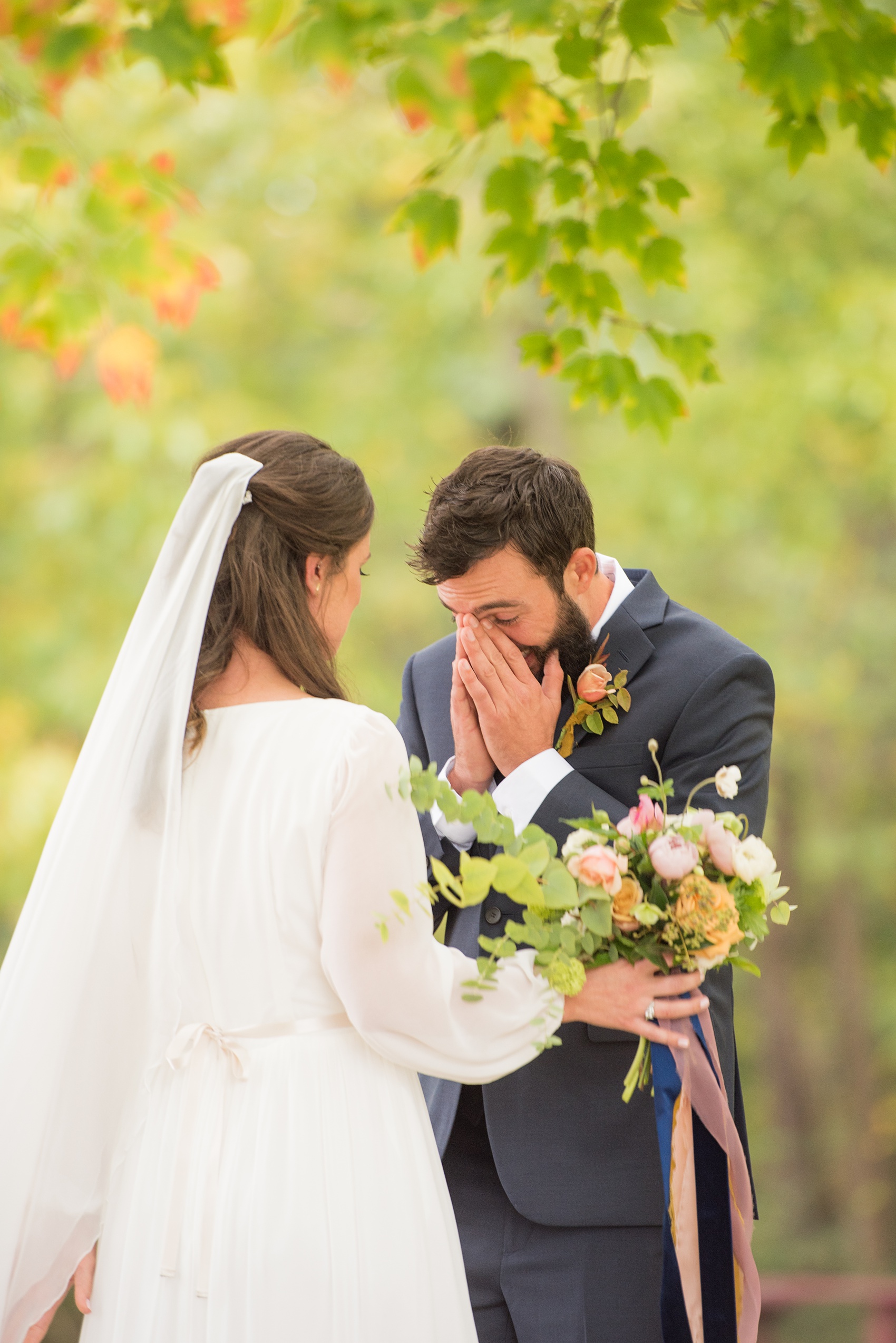 Mikkel Paige Photography photos from a wedding at Leslie-Alford Mims House in North Carolina. Picture of the Boho bride and groom in a navy suit for their fall day.