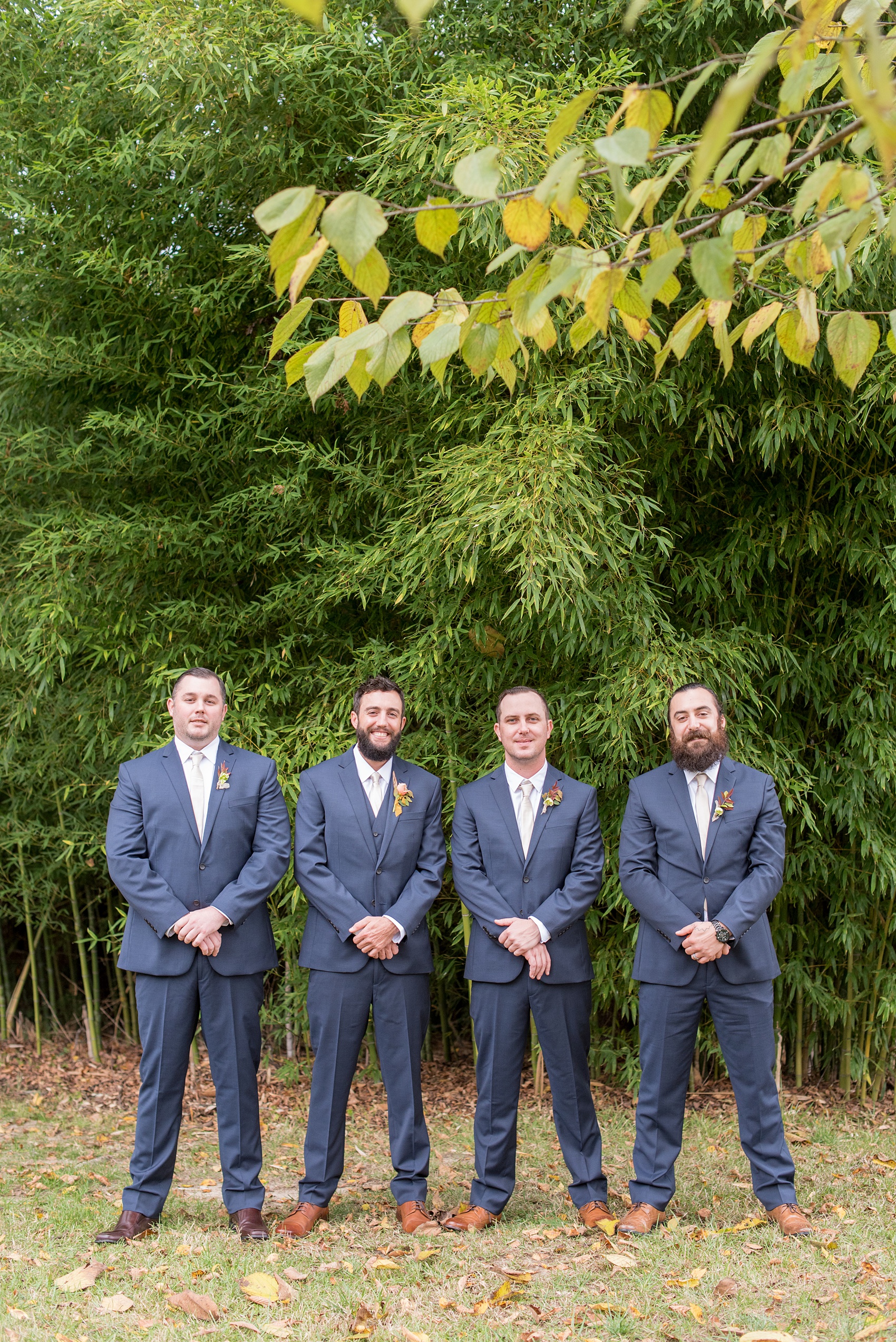 Mikkel Paige Photography photos from a wedding at Leslie-Alford Mims House in North Carolina. Picture of the groomsmen in navy blue linen suits for a fall Mad Dash Weddings event.