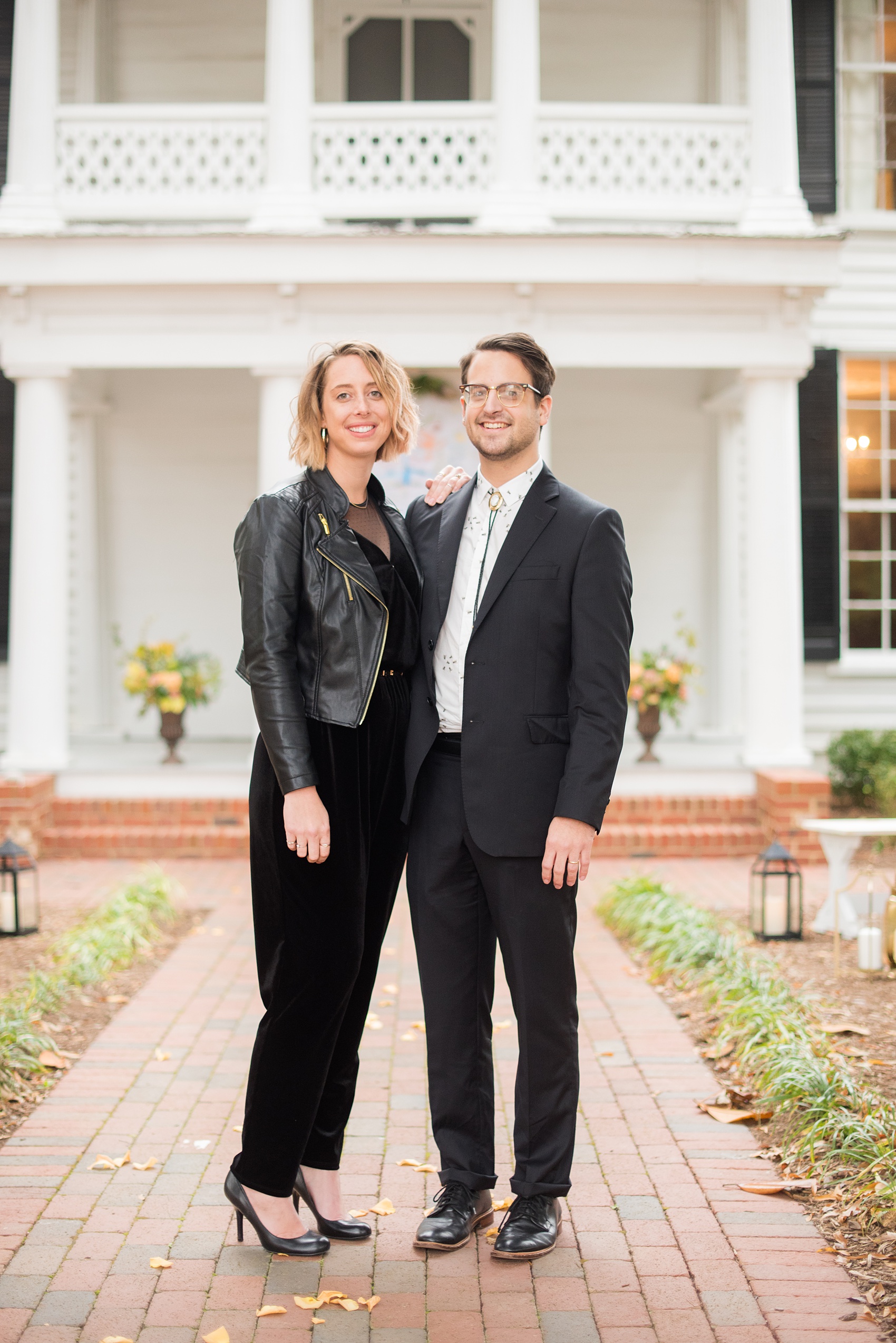 Mikkel Paige Photography photos from a wedding at Leslie-Alford Mims House in North Carolina. Picture of two trendy guests.