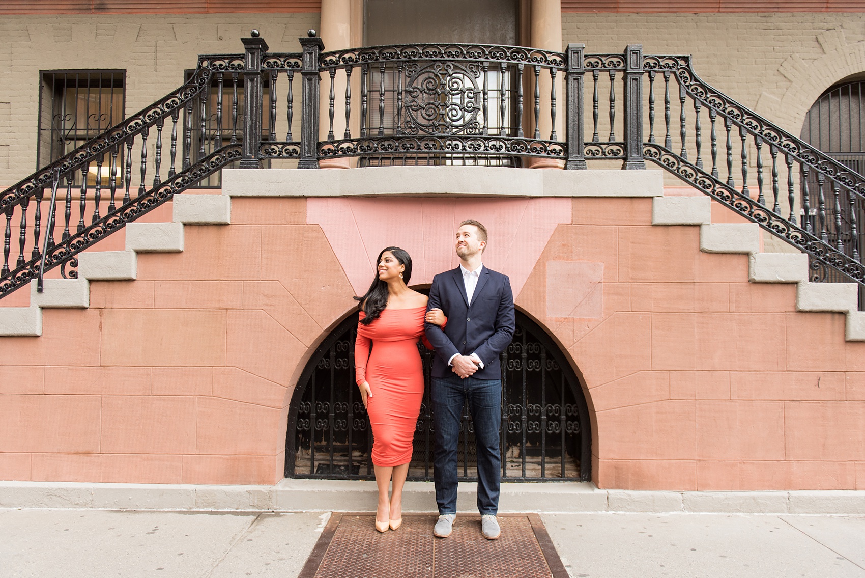 Mikkel Paige Photography pictures of an engagement session in Tribeca. A photo of the couple with great architecture.