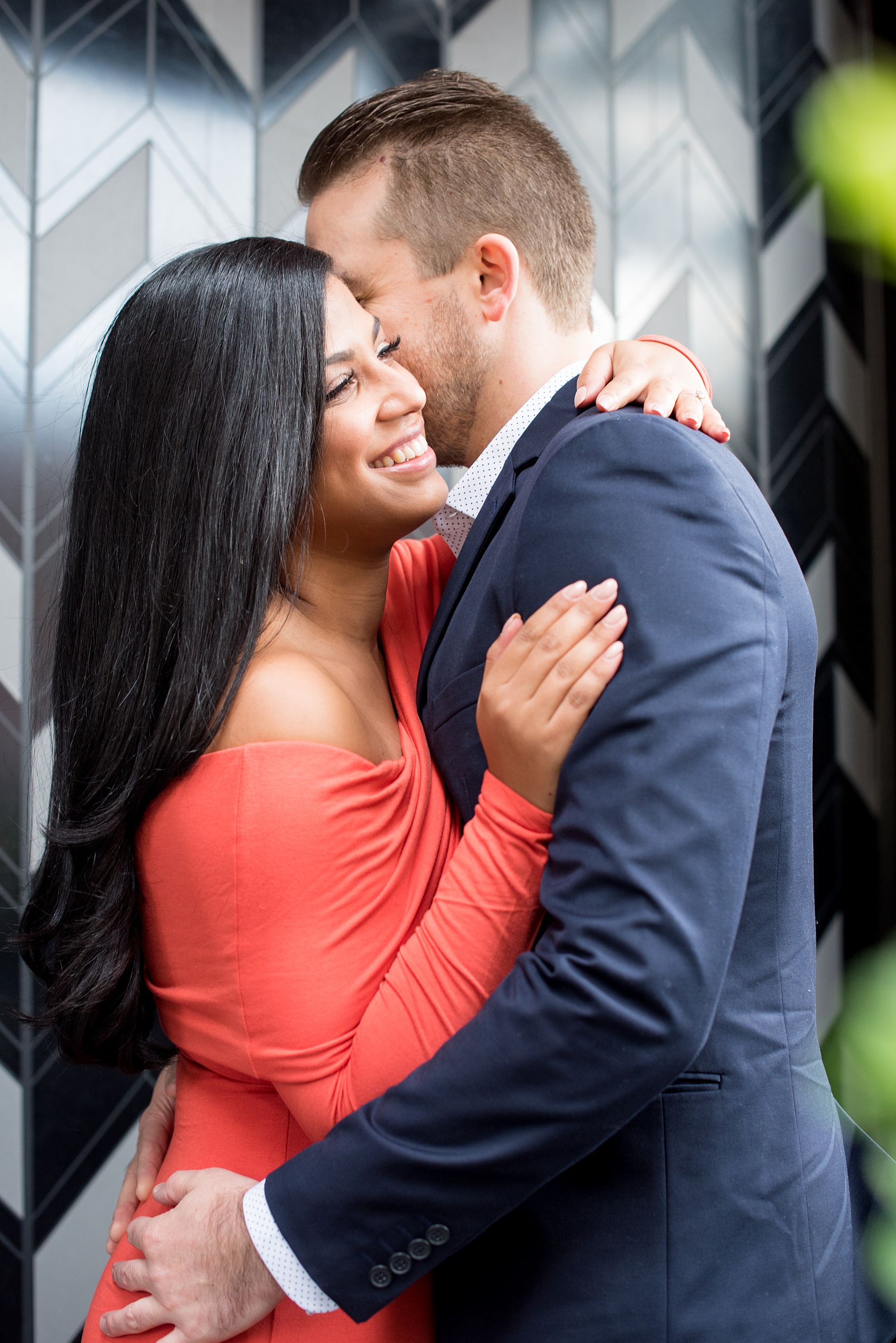 Mikkel Paige Photography pictures of an engagement session in Tribeca. A photo of the couple embracing.