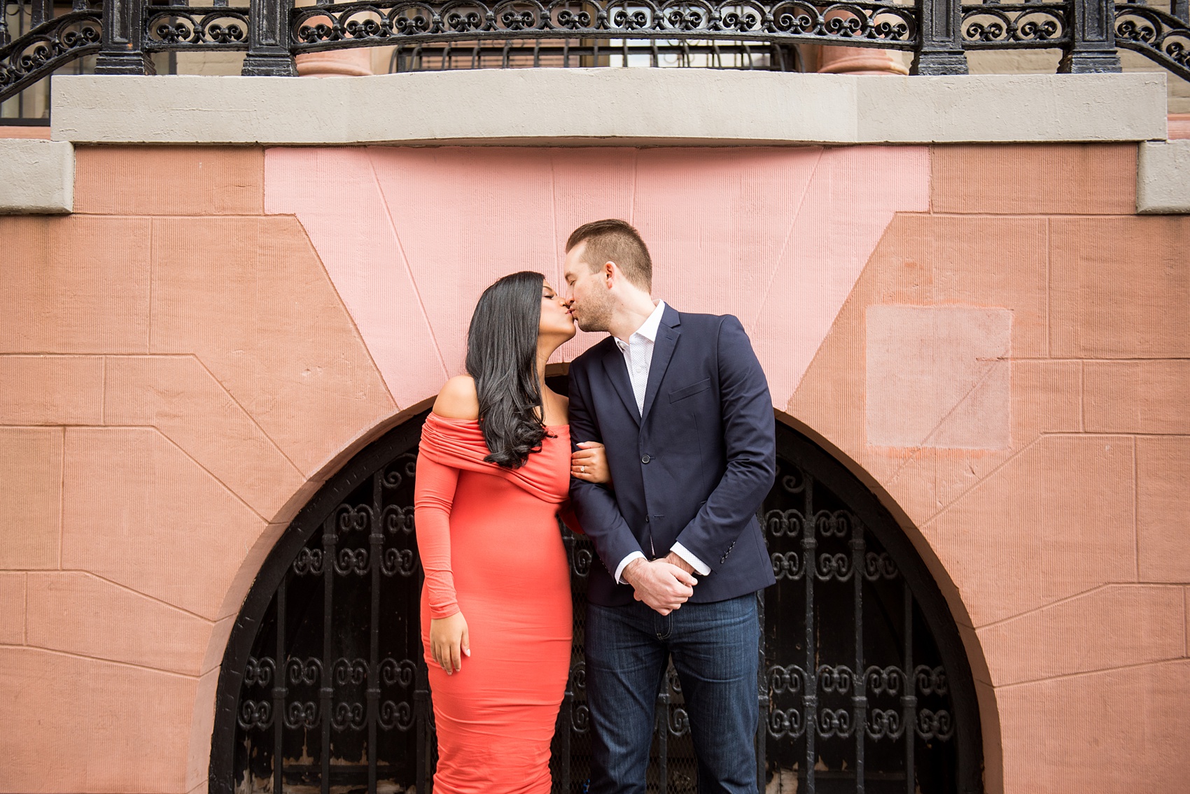 Mikkel Paige Photography pictures of an engagement session in Tribeca. A photo of the couple with great architecture.