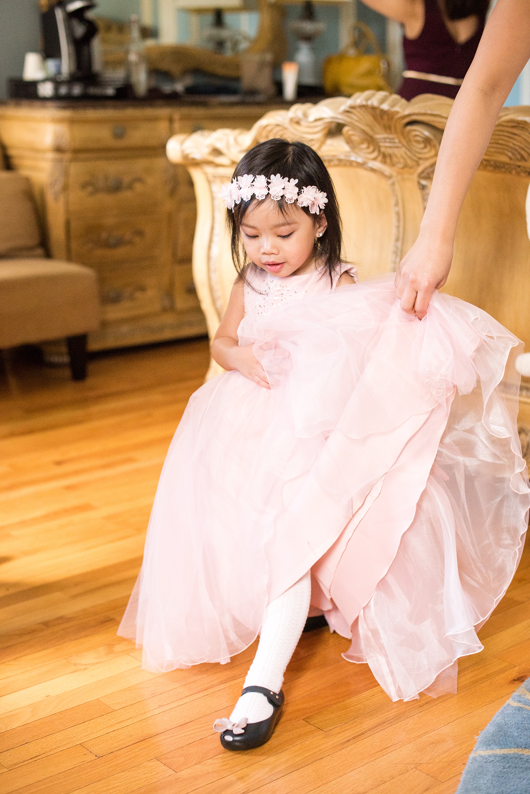 Mikkel Paige Photography photos of a wedding at Crabtree's Kittle House in Chappaqua, New York. Picture of the bride's niece who was their flower girl.