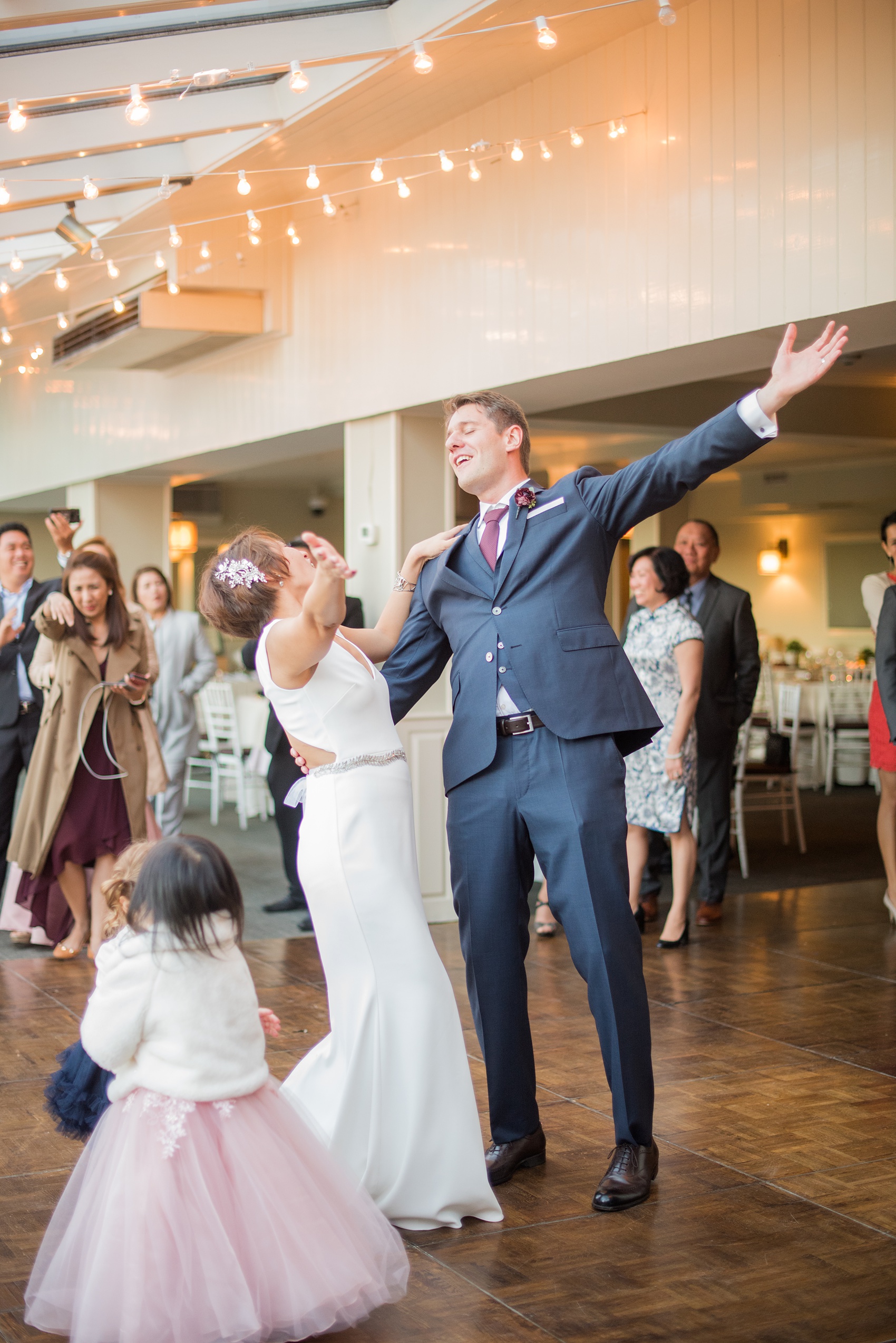 Mikkel Paige Photography photos of a wedding at Crabtree's Kittle House in Chappaqua, New York. Picture of the bride and groom singing and enjoying their reception!