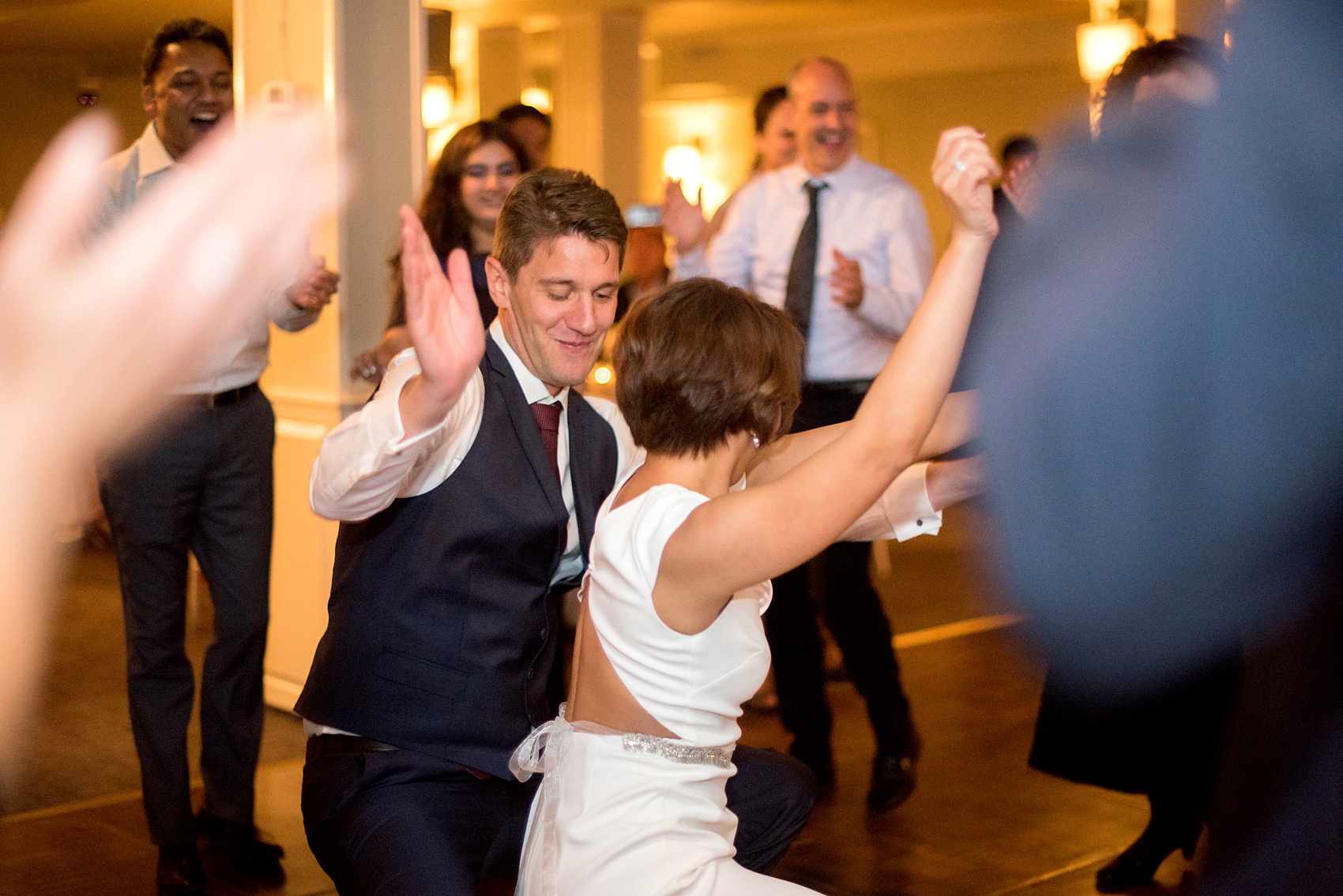 Mikkel Paige Photography photos of a wedding at Crabtree's Kittle House in Chappaqua, New York. Picture of the bride and groom dancing during the reception.