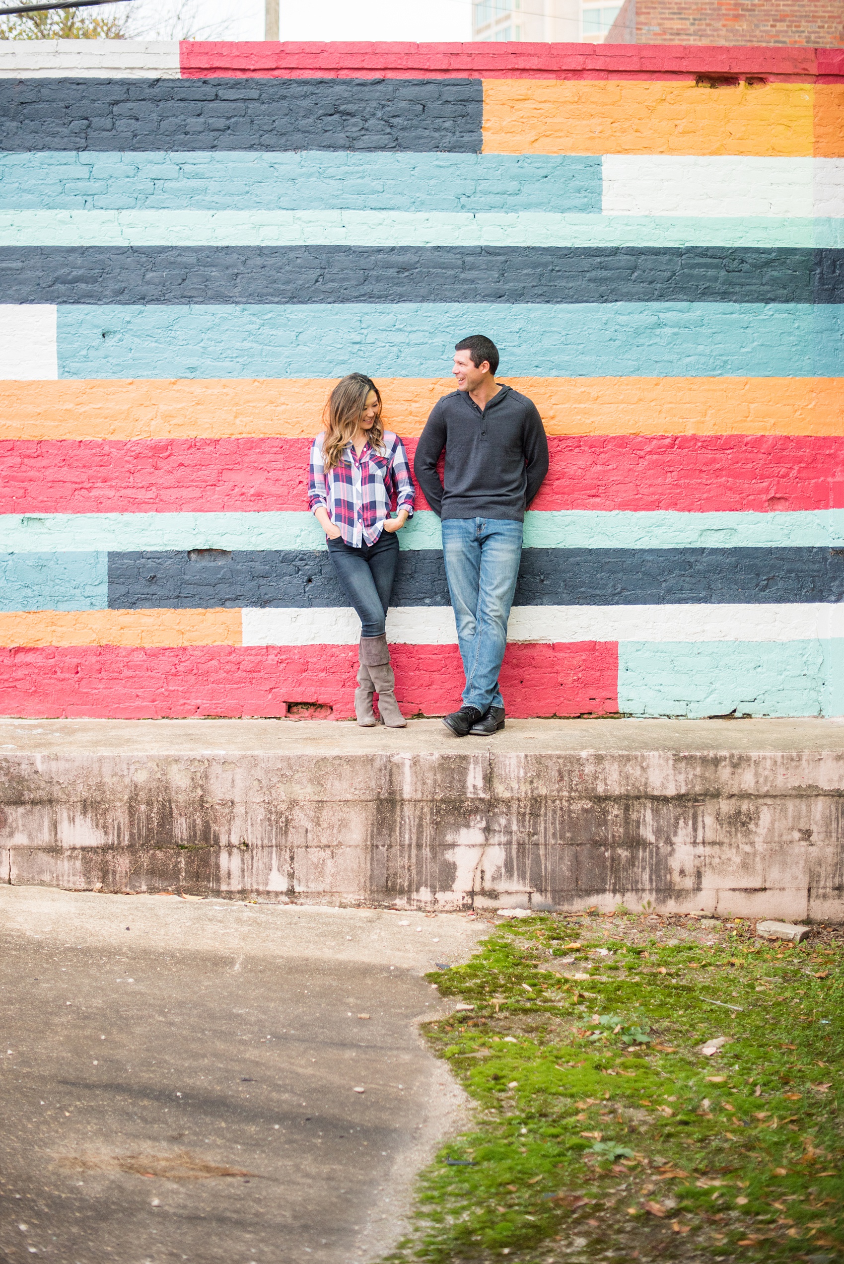 Colorful photos taken during a fall, autumn season engagement anniversary session. Images taken by Mikkel Paige Photography in an urban city setting. Click through to see more from this vibrant, unique photography session with lots of fun colors, street art murals and ideas for outfits!