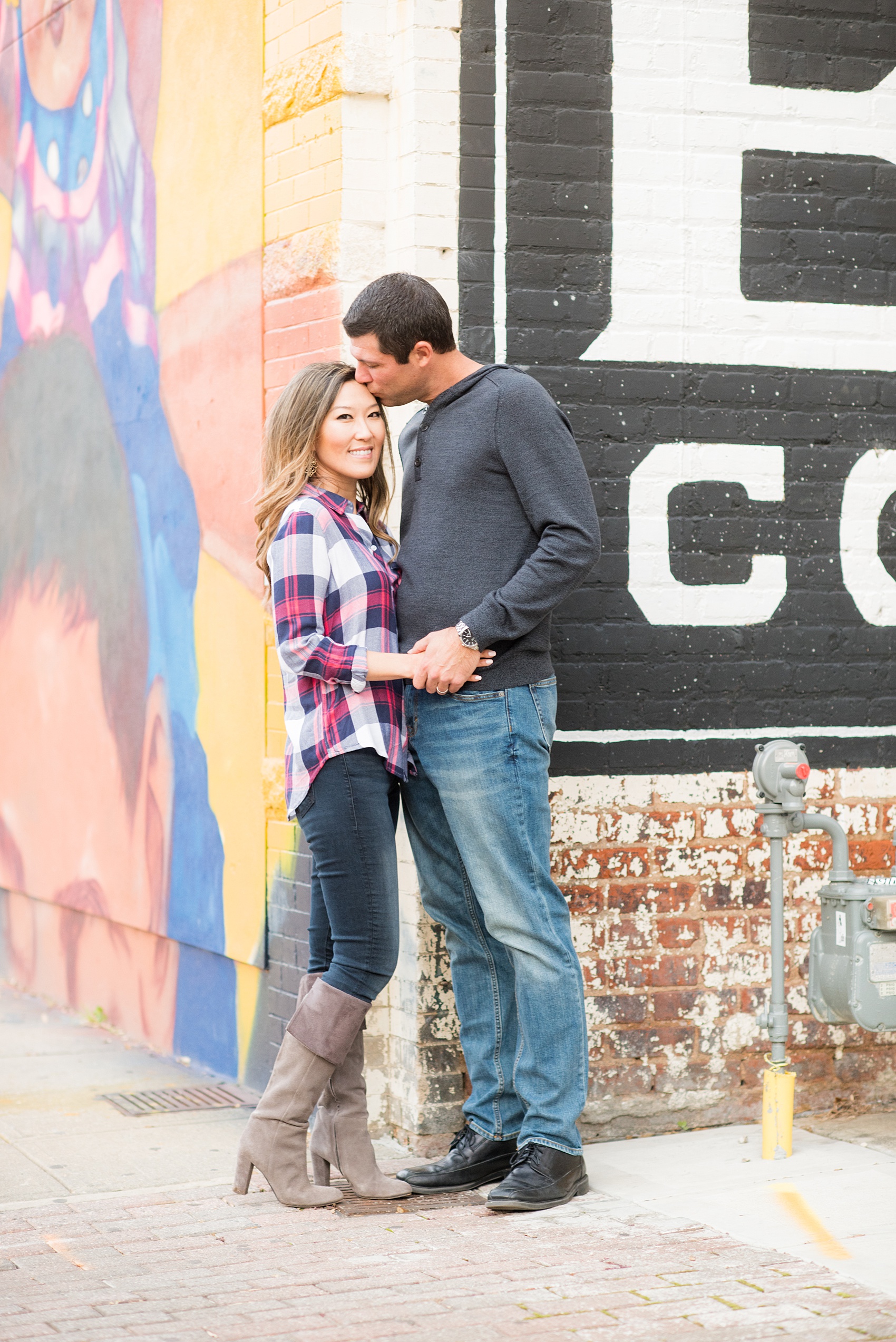 Colorful photos taken during a fall, autumn season engagement anniversary session. Images taken by Mikkel Paige Photography in an urban city setting. Click through to see more from this vibrant, unique photography session with lots of fun colors, street art murals and ideas for outfits!