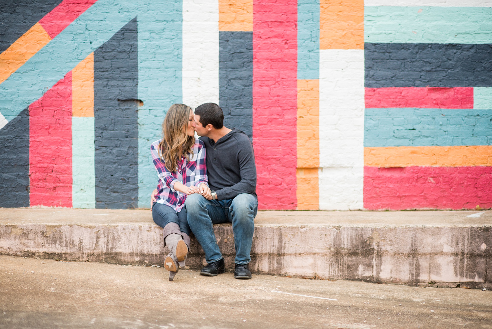 Colorful photos taken during a fall, autumn season engagement anniversary session. Images taken by Mikkel Paige Photography in an urban city setting. Click through to see more from this vibrant, unique photography session with lots of fun colors, street art murals and ideas for outfits!