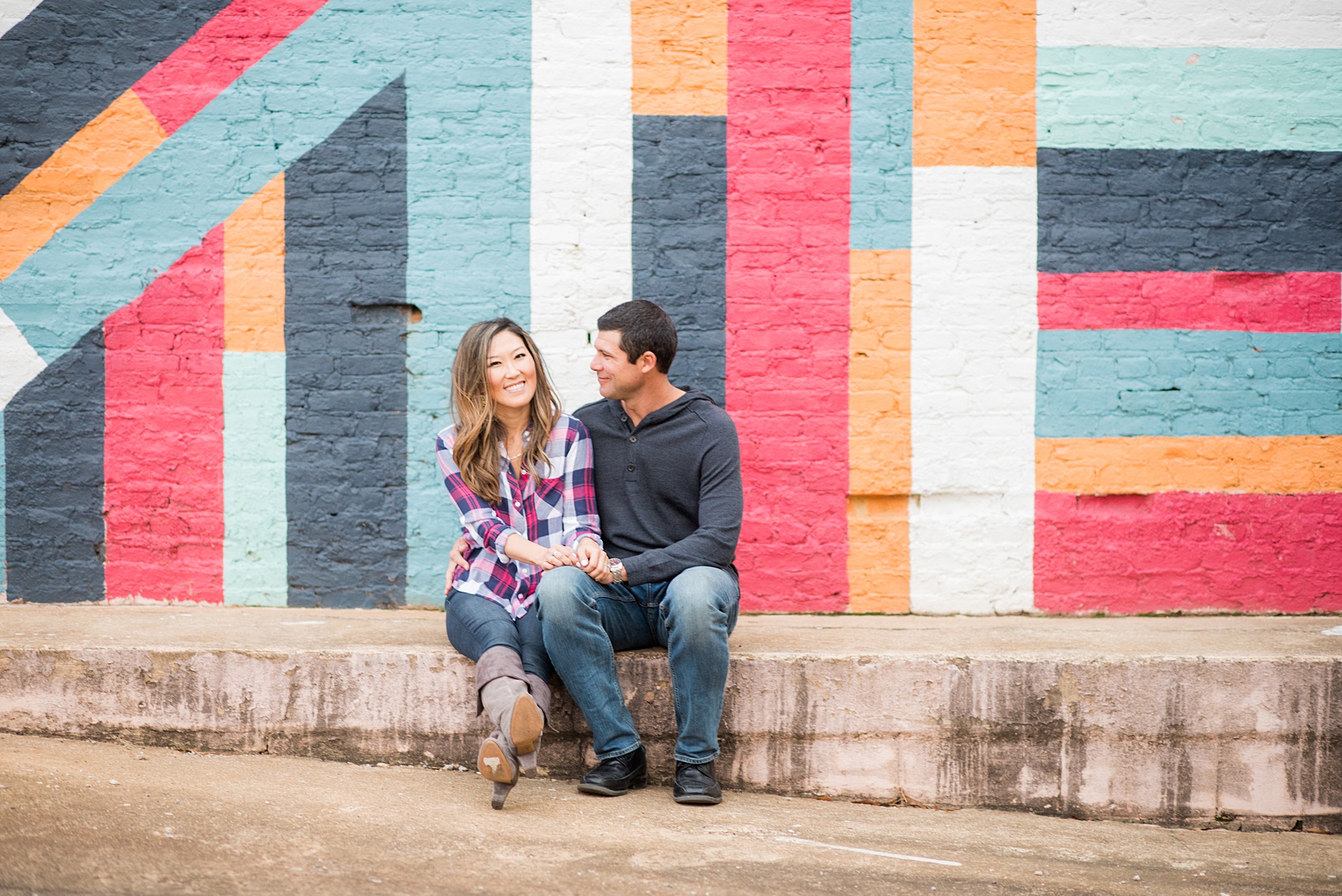 Colorful photos taken during a fall, autumn season engagement anniversary session. Images taken by Mikkel Paige Photography in an urban city setting. Click through to see more from this vibrant, unique photography session with lots of fun colors, street art murals and ideas for outfits!
